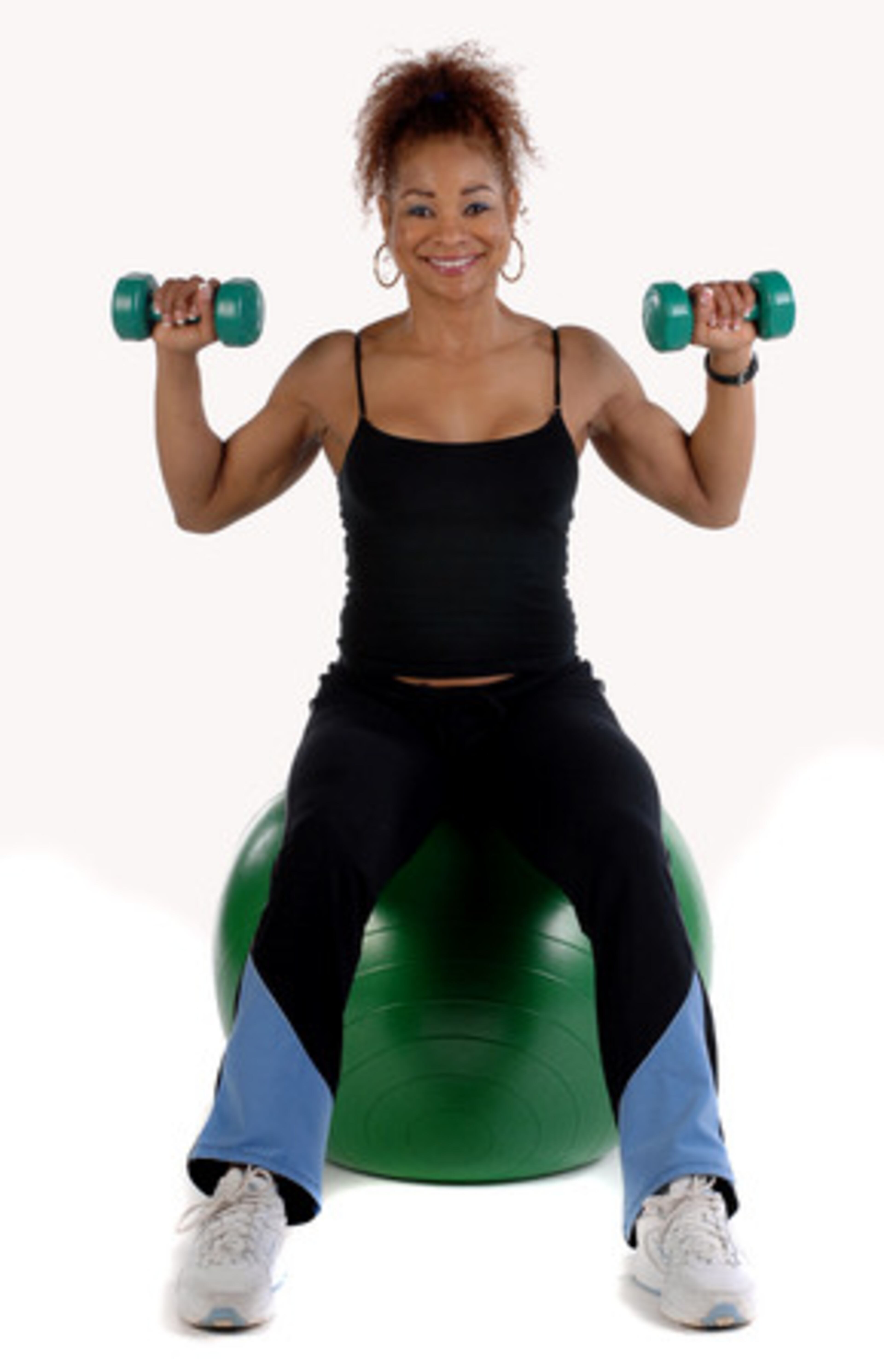 SHOULDER PRESS. Muscles trained: Shoulders (anterior, medial and posterior deltoids). Sit on an exercise ball and stabilize your body by contracting your abdominals. Start with your hands at shoulder level, press your arms up and slightly in front, but not directly over your head.