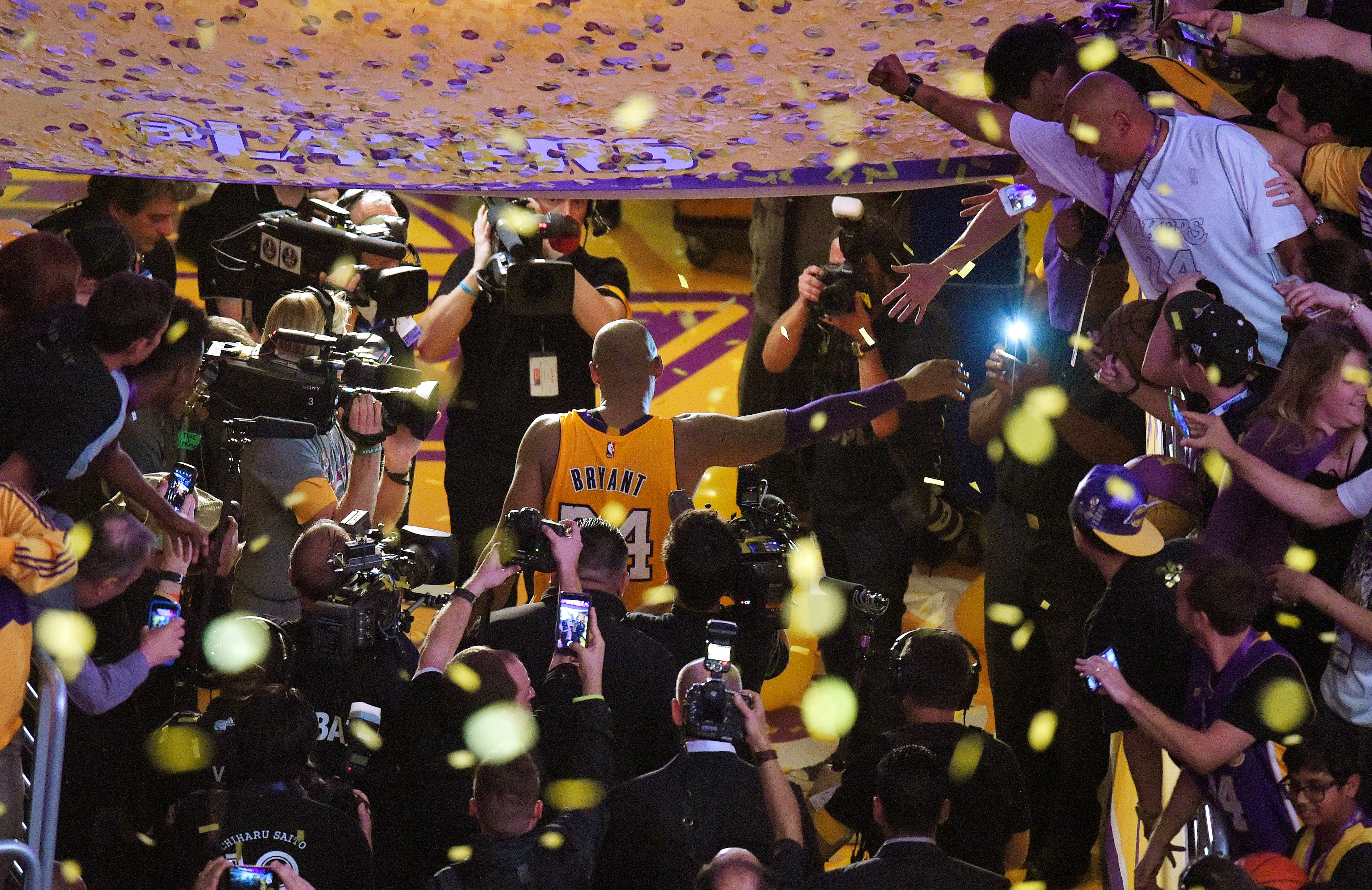 Los Angeles Lakers forward Kobe Bryant walks off the court after finishing his last NBA basketball game before retirement, against the Utah Jazz on Wednesday, April 13, 2016, in Los Angeles. Bryant scored 60 points as the Lakers won 101-96. (AP Photo/Mark J. Terrill)