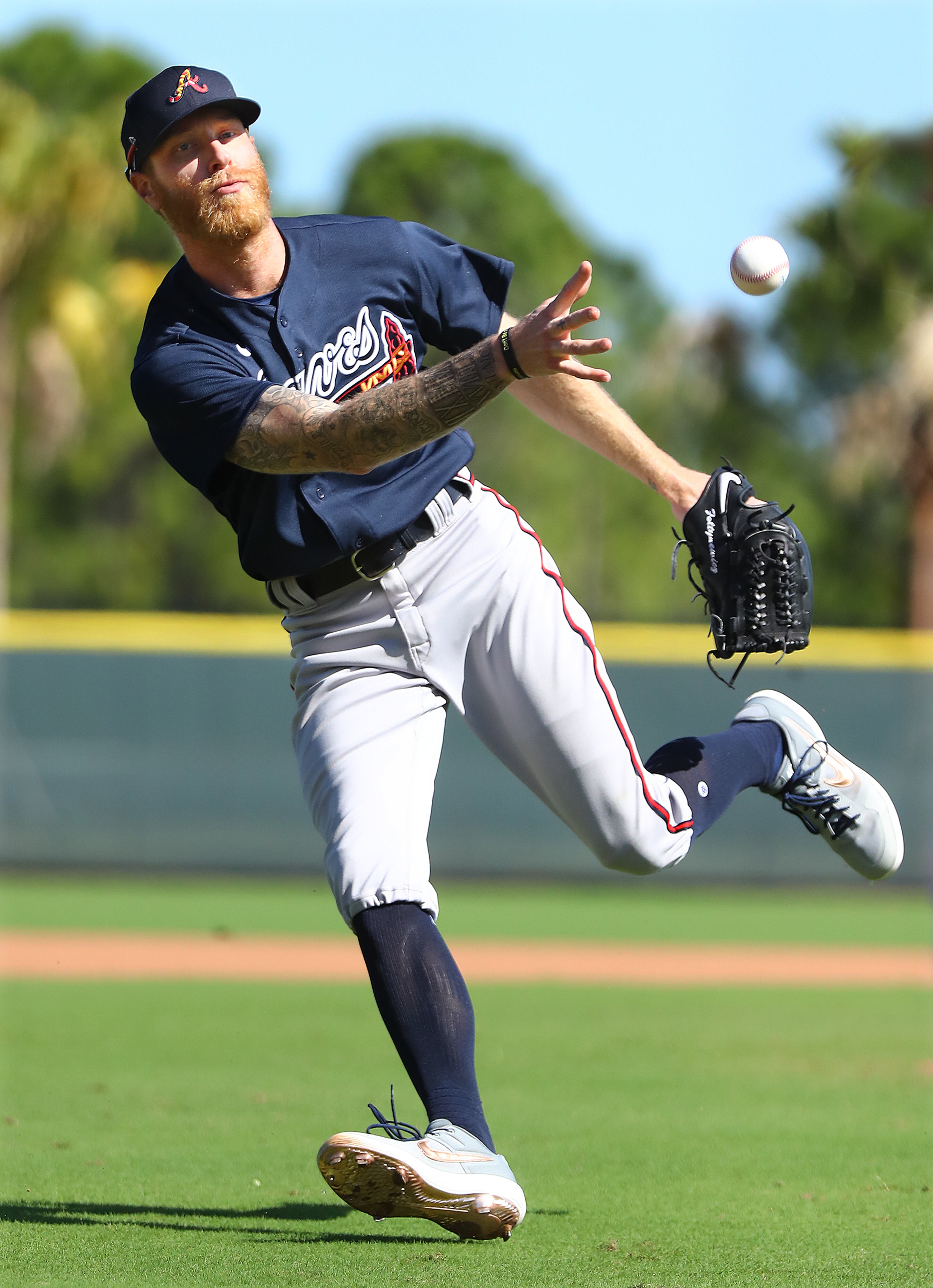 Braves pitcher Mike Foltynewicz comes off the mound to field a ground ball during spring training on Saturday, Feb. 15, 2020, in North Port. Curtis Compton ccompton@ajc.com