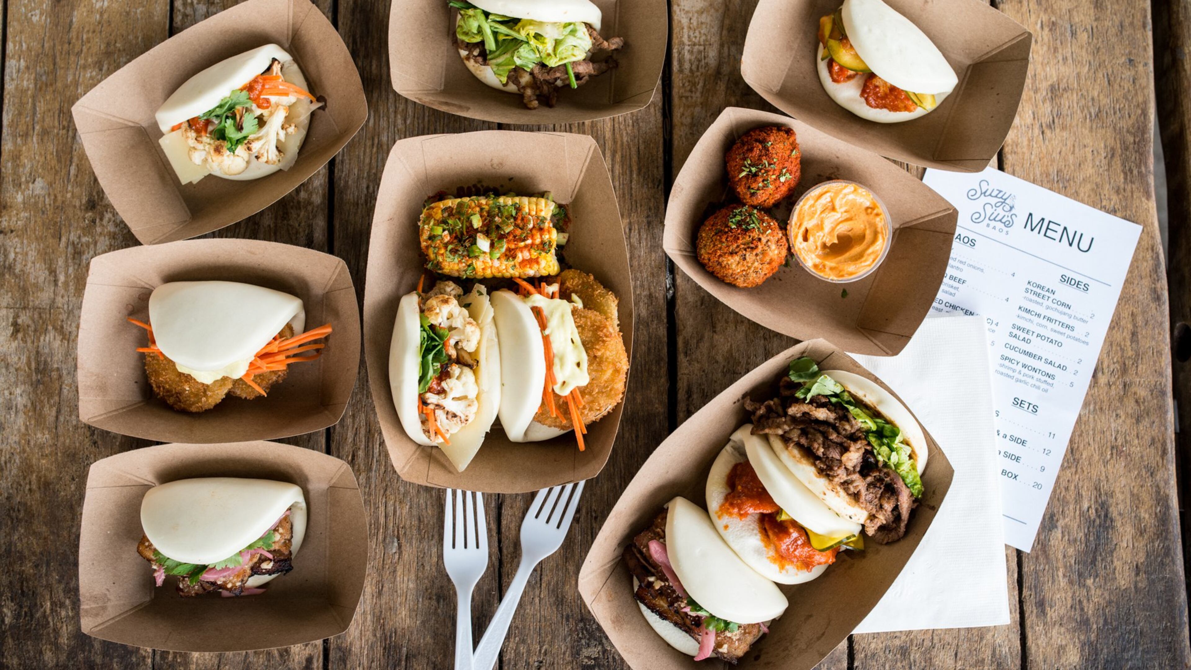 Assortment of baos and sides from Suzy Siu's Baos. Photo credit- Mia Yakel.