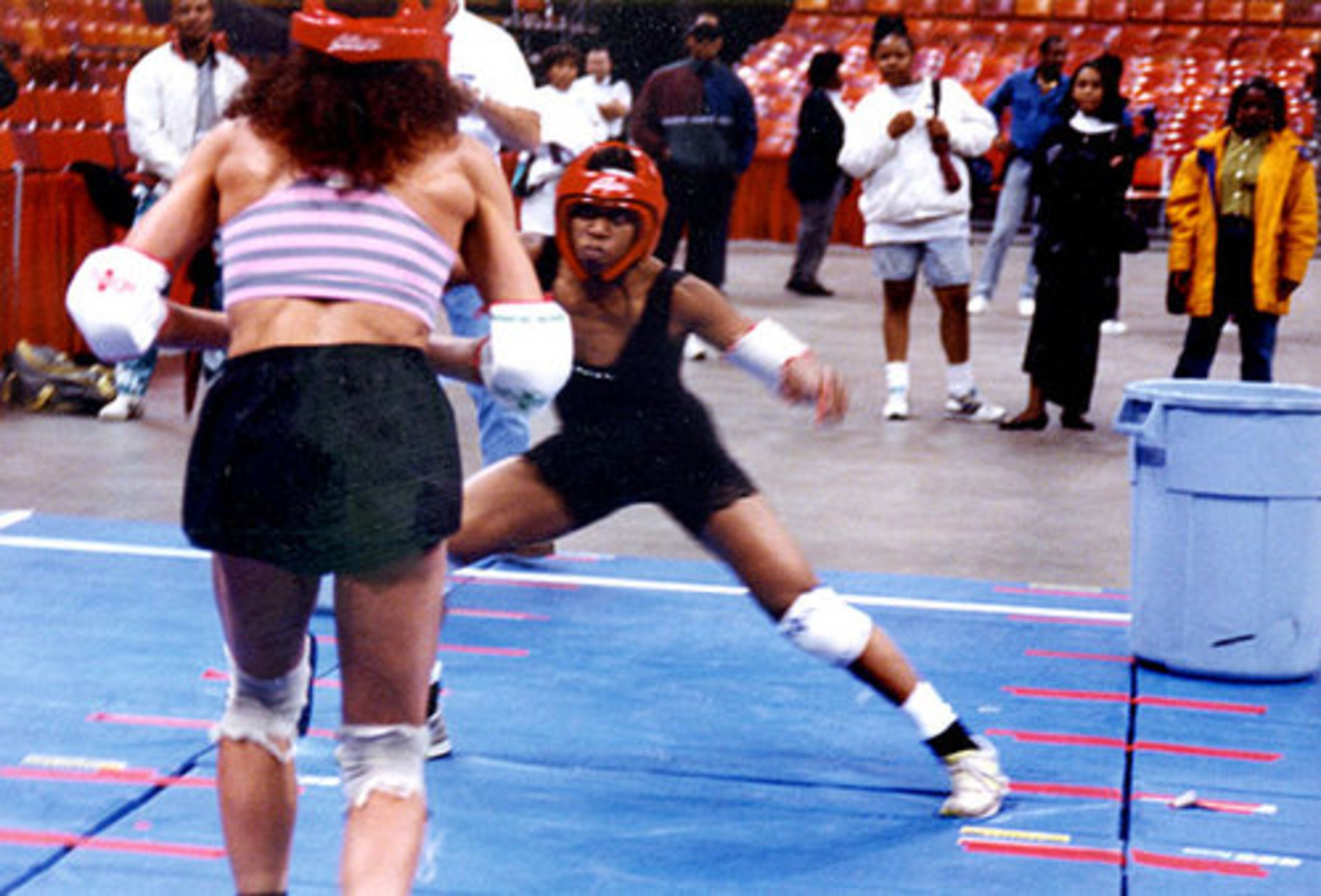 Carolyn Whitmire trying out for 'American Gladiators' at the Omni coliseum, near the current site of Philips Arena, in March 1992. In this photo, she's doing the "Powerball" competition.