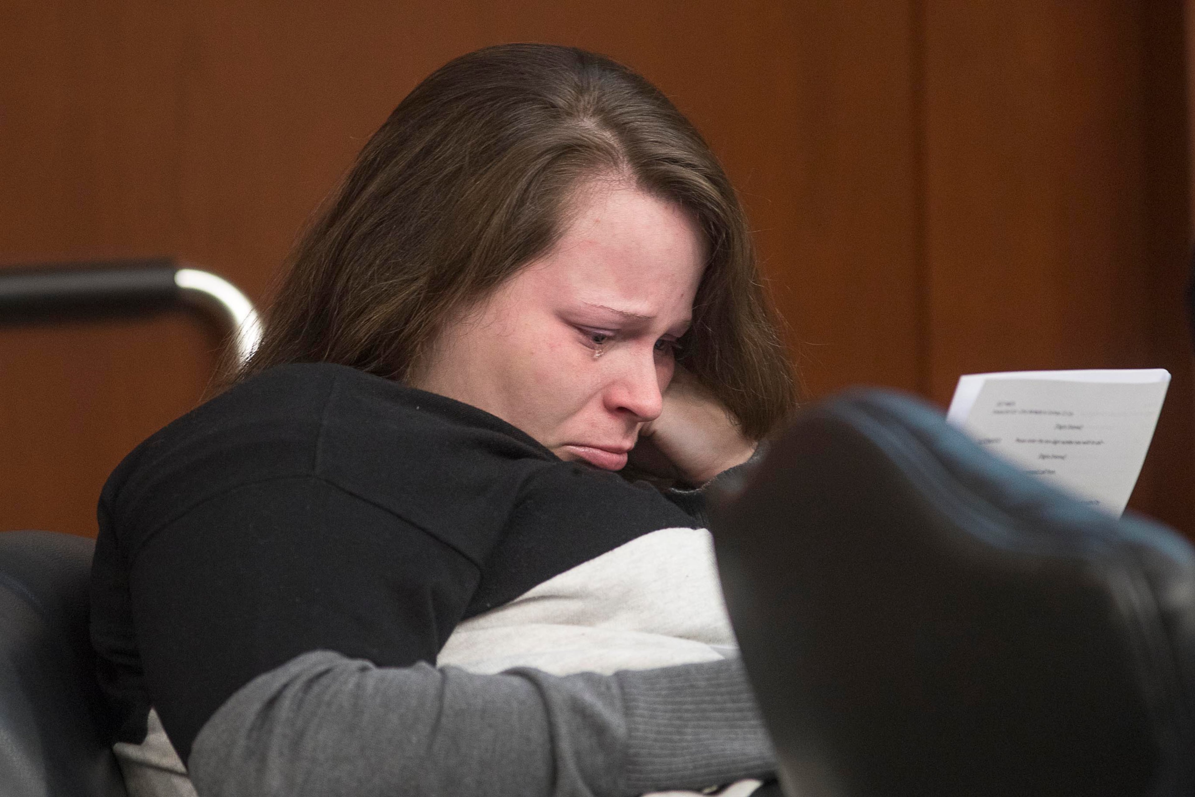 05/13/2019 -- Covington, Georgia -- Cortney Bell becomes emotional while listening to a recording of a phone conversation she had with her co-defendant, Christopher McNabb, during their murder trial in front of Georgia Chief Superior Court Judge John M. Ott at the Newton County Courthouse in Covington, Monday, May 13, 2019. (ALYSSA POINTER/ALYSSA.POINTER@AJC.COM)