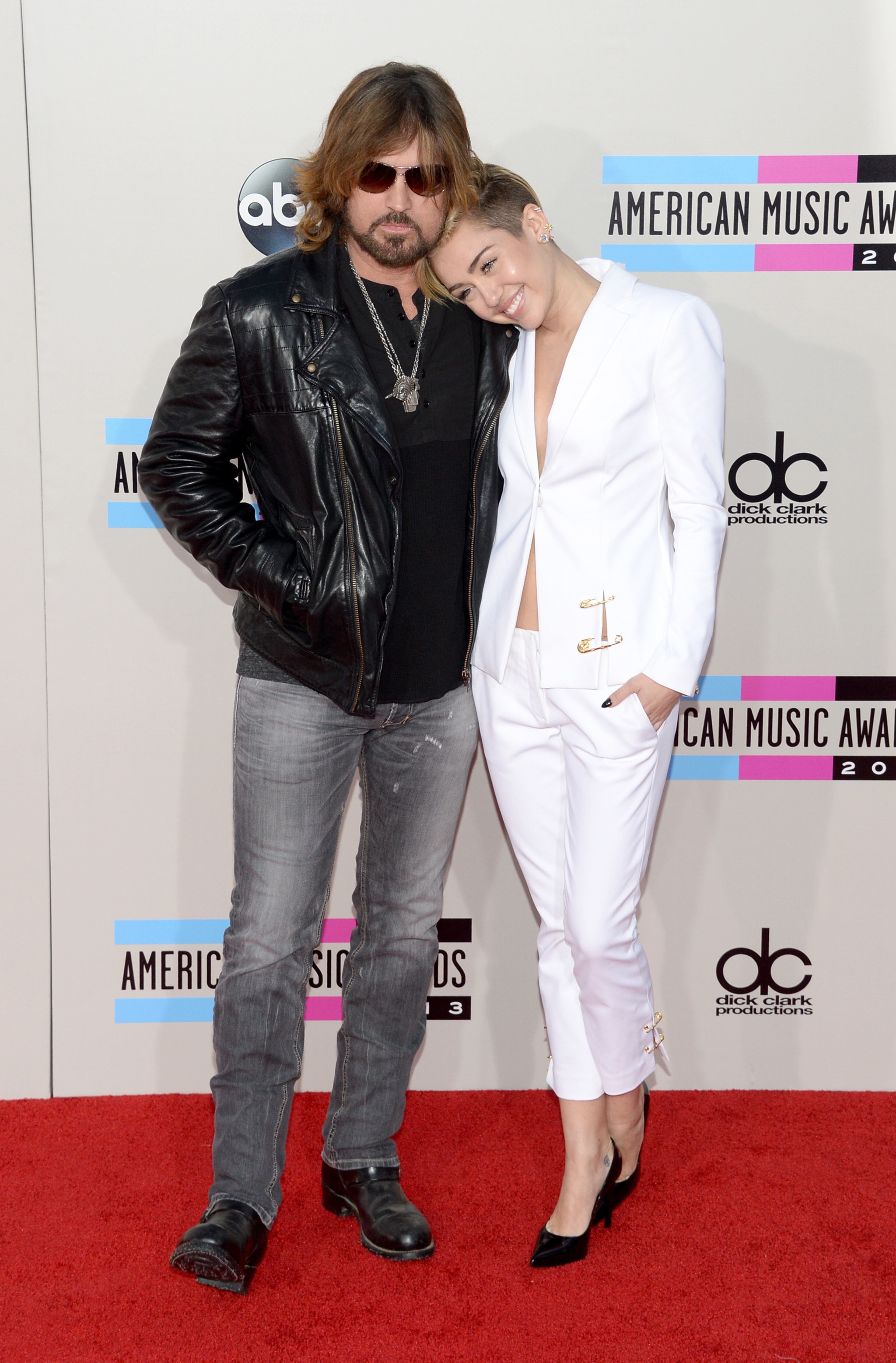 LOS ANGELES, CA - NOVEMBER 24: Singers Billy Ray Cyrus and Miley Cyrus attend the 2013 American Music Awards at Nokia Theatre L.A. Live on November 24, 2013 in Los Angeles, California. (Photo by Jason Kempin/Getty Images)