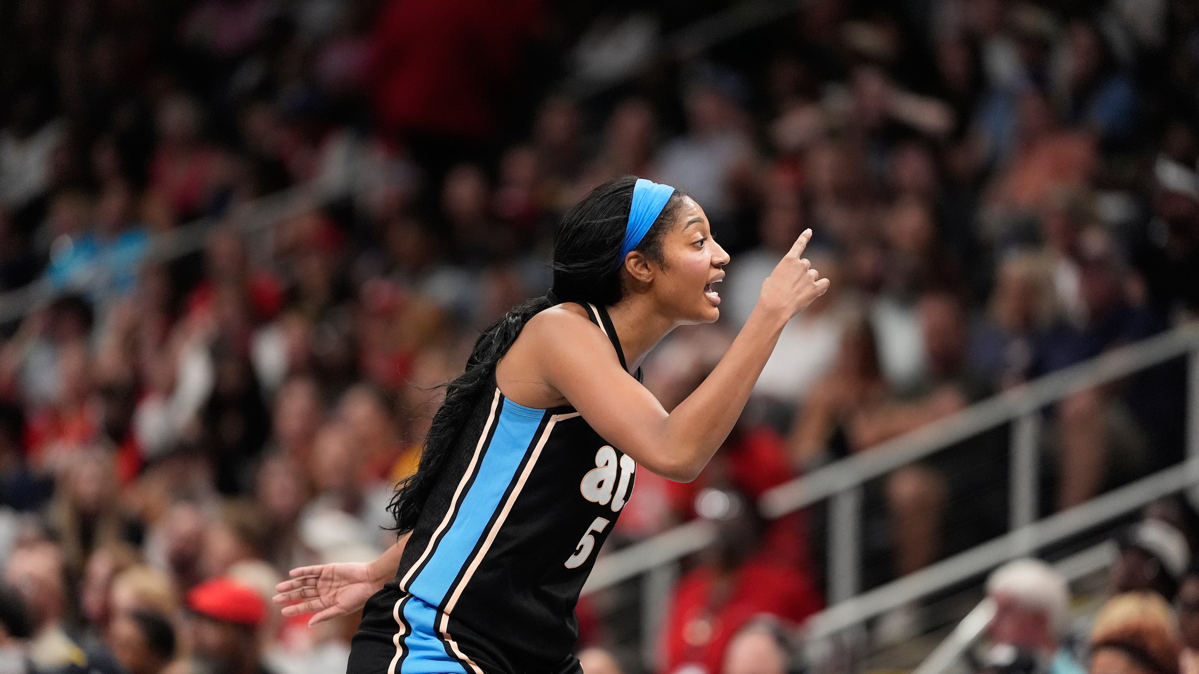 Atlanta Dream forward Angel Reese (5) reacts in the second half of an WNBA basketball game Sunday, Aug. 16, 2026, in Atlanta. (AP Photo/Brynn Anderson)