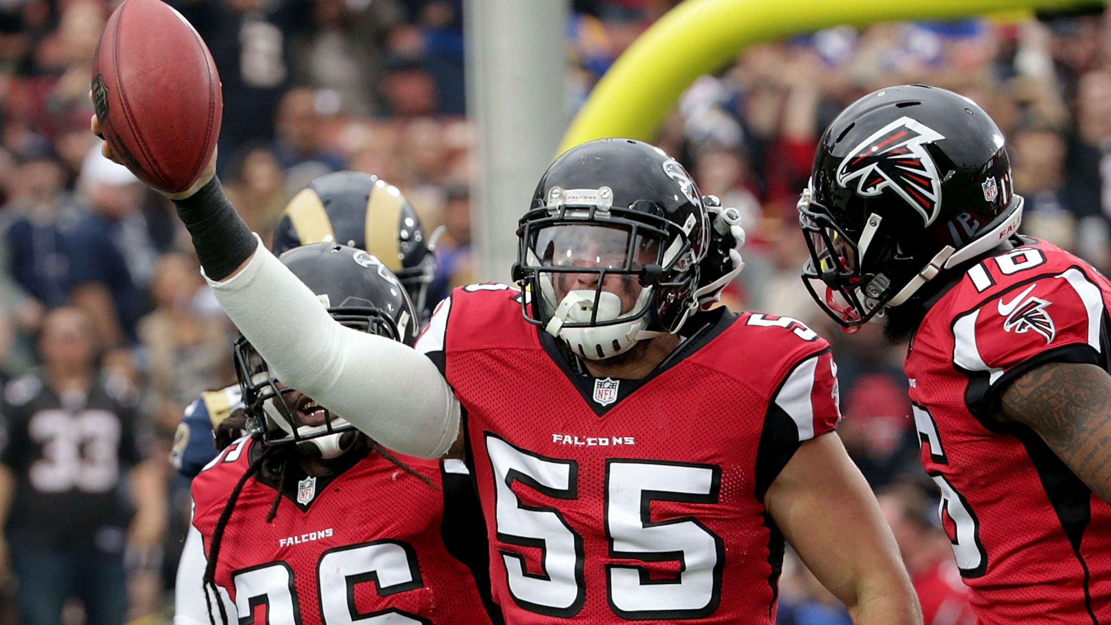 LOS ANGELES, CA - DECEMBER 11: (L-R) Kemal Ishmael #36, Paul Worrilow #55 and Justin Hardy #16 of the Atlanta Falcons celebrate Worrilow's fumble recovery on the opening kick off in the first quarter at Los Angeles Memorial Coliseum on December 11, 2016 in Los Angeles, California. (Photo by Jeff Gross/Getty Images)