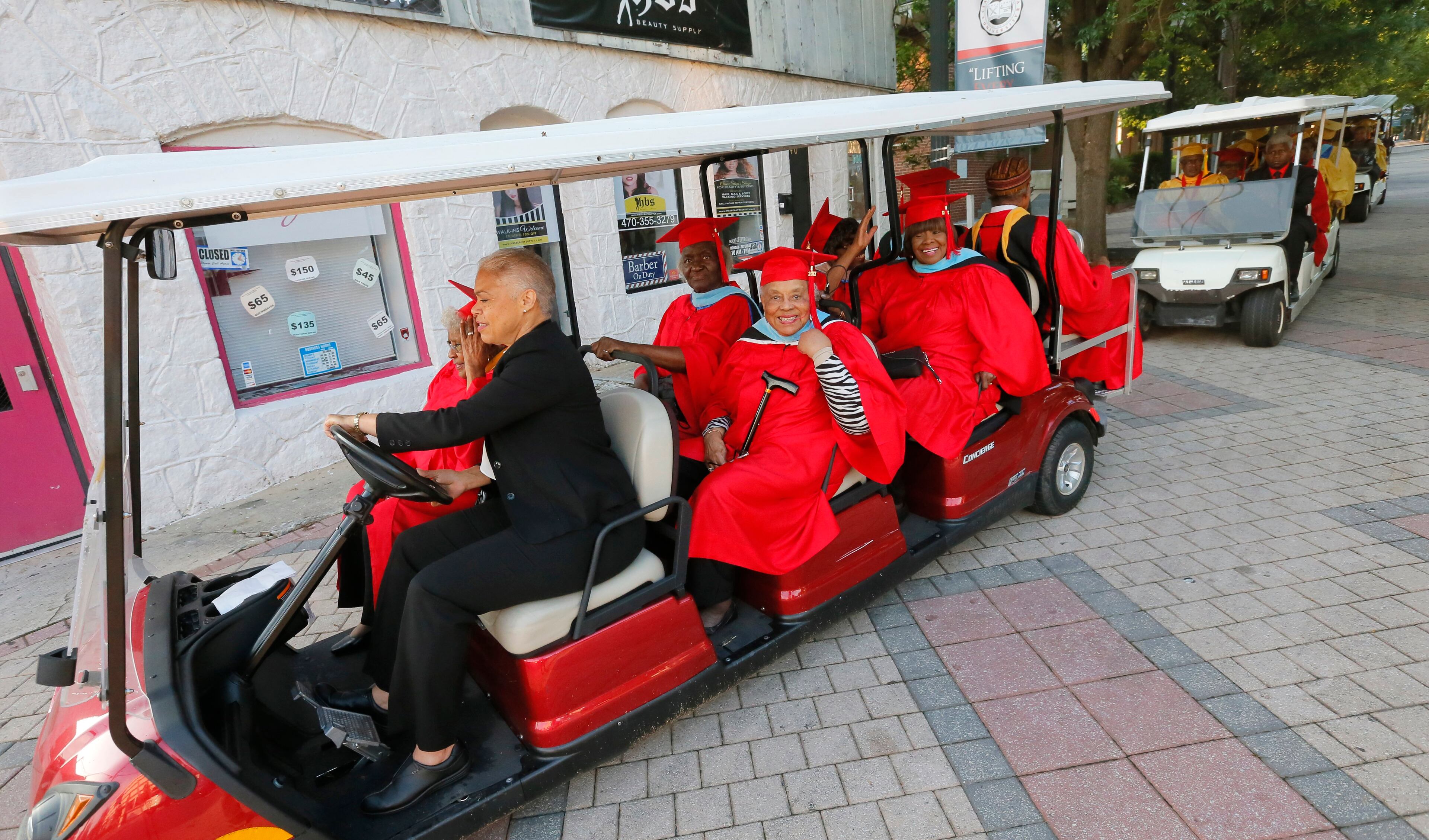 5/22/17 - Atlanta - Legacy Alumni members are driven to the ceremony. Clark Atlanta University's Panther Stadium was the site of their 28th annual Commencement. Businessman William Pickard gave the commencement address. Rev. Jesse Jackson, who received an honorary degree, also spoke. Panther Stadium, BOB ANDRES /BANDRES@AJC.COM