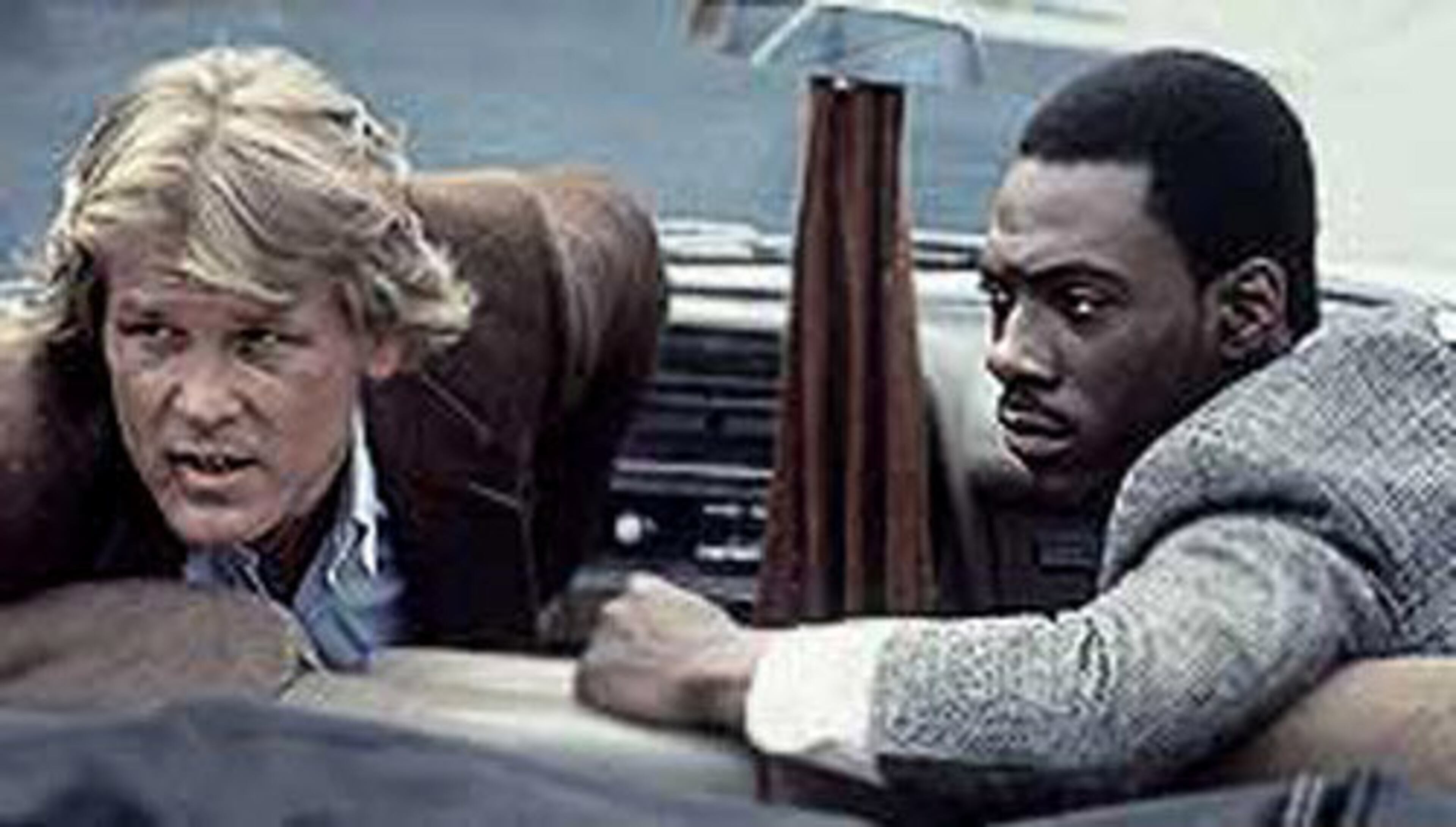 Nick Nolte and Eddie Murphy in '48 Hrs.' This was Eddie's first major film. '48 Hrs.' is often credited as being the first "buddy cop" film.