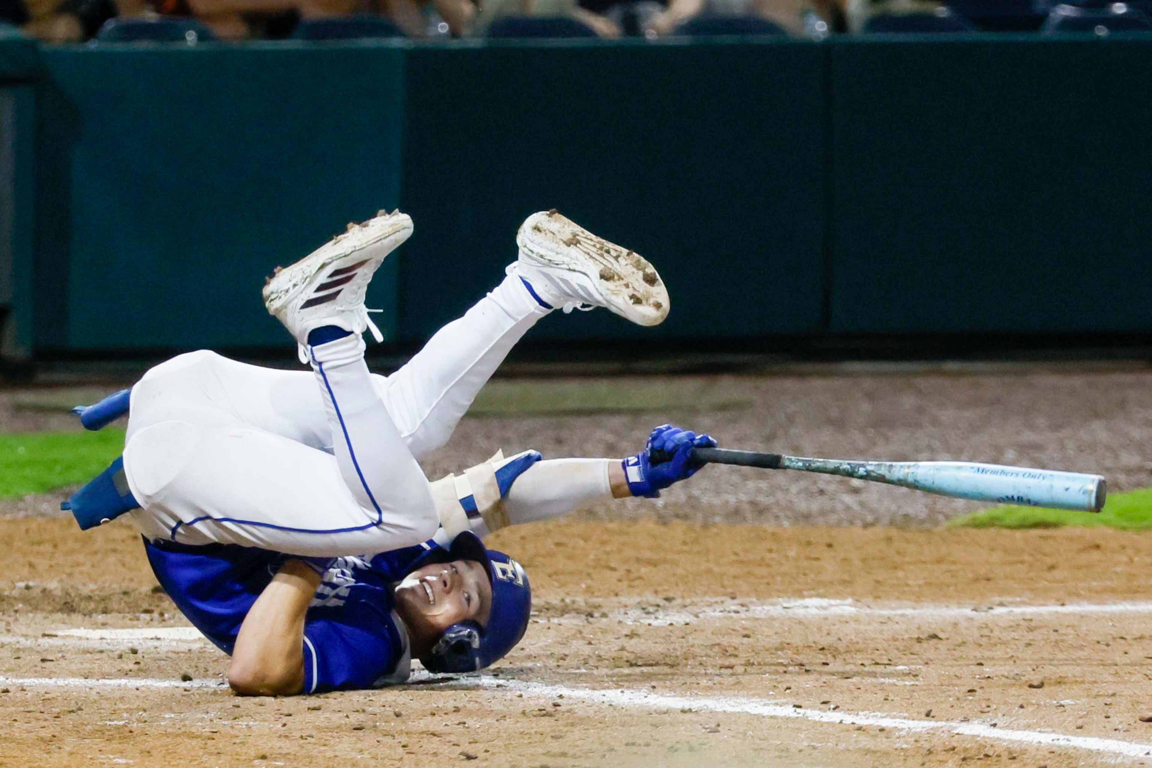 Etowah Eagles center fielder Trevor Condon falls to the ground after being hit by a pitch during game 1 of the Class 6A GHSA Baseball State Championship Series at Gwinnett Field, Tuesday, May 26, 2026, in Lawrenceville, Ga. (Miguel Martinez/AJC)