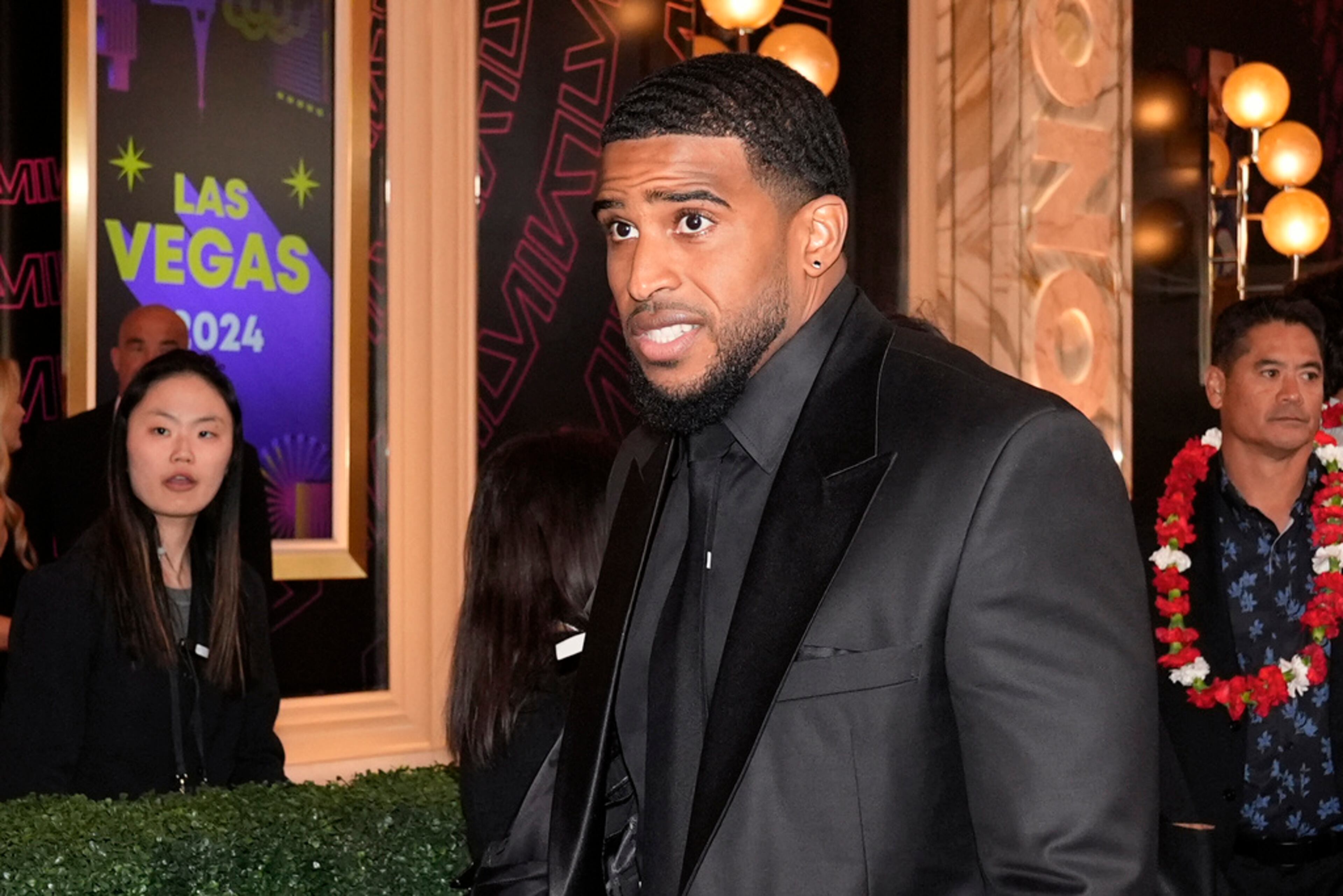Bobby Wagner of the Seattle Seahawks walks on the red carpet at the NFL Honors award show ahead of the Super Bowl 58 football game Thursday, Feb. 8, 2024, in Las Vegas. The San Francisco 49ers face the Kansas City Chiefs in Super Bowl 58 on Sunday. (AP Photo/Godofredo A. Vásquez)