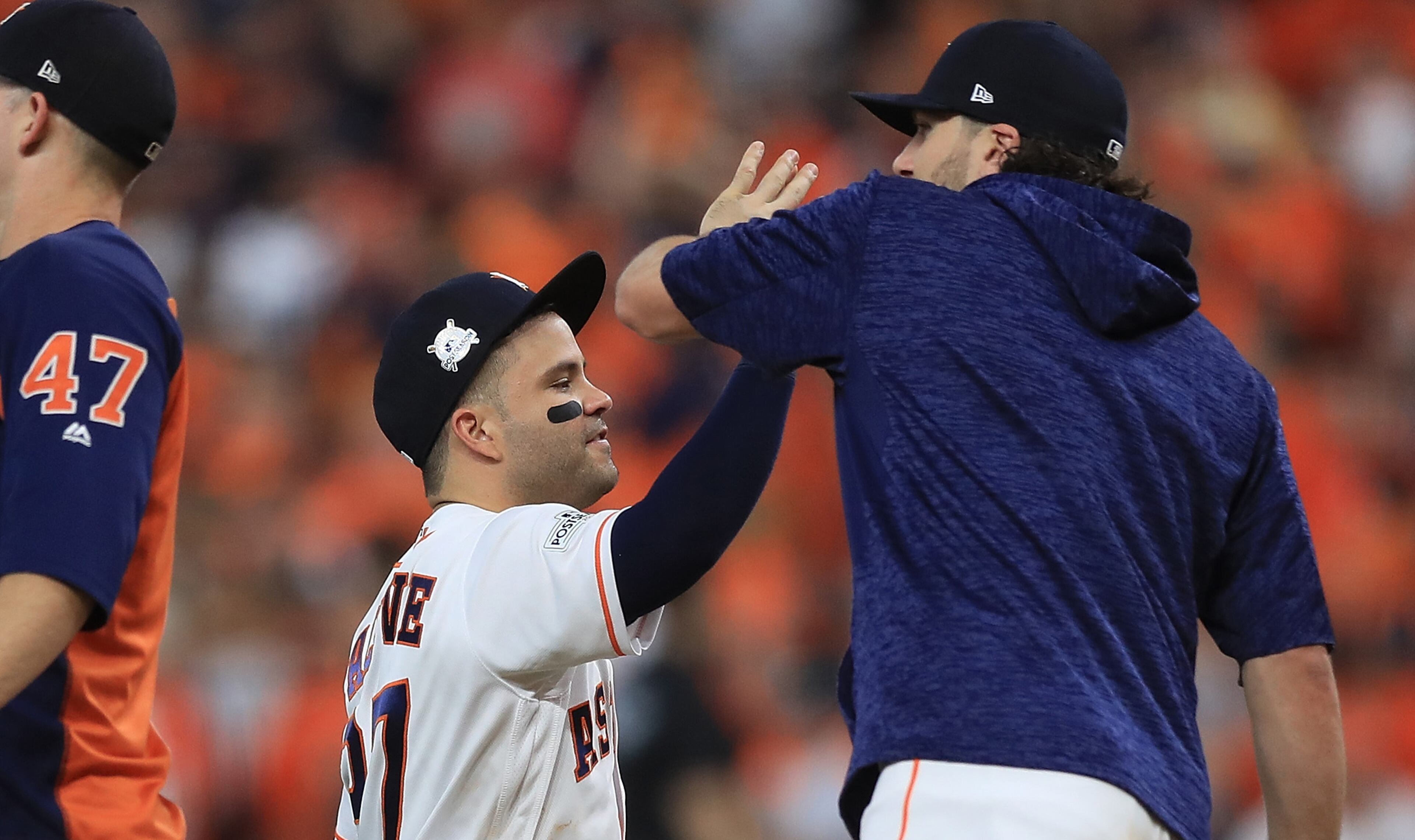 HOUSTON, TX - OCTOBER 05: Jose Altuve #27 of the Houston Astros celebrates a 8-2 win against the Boston Red Sox during game one of the American League Division Series at Minute Maid Park on October 5, 2017 in Houston, Texas. (Photo by Ronald Martinez/Getty Images)
