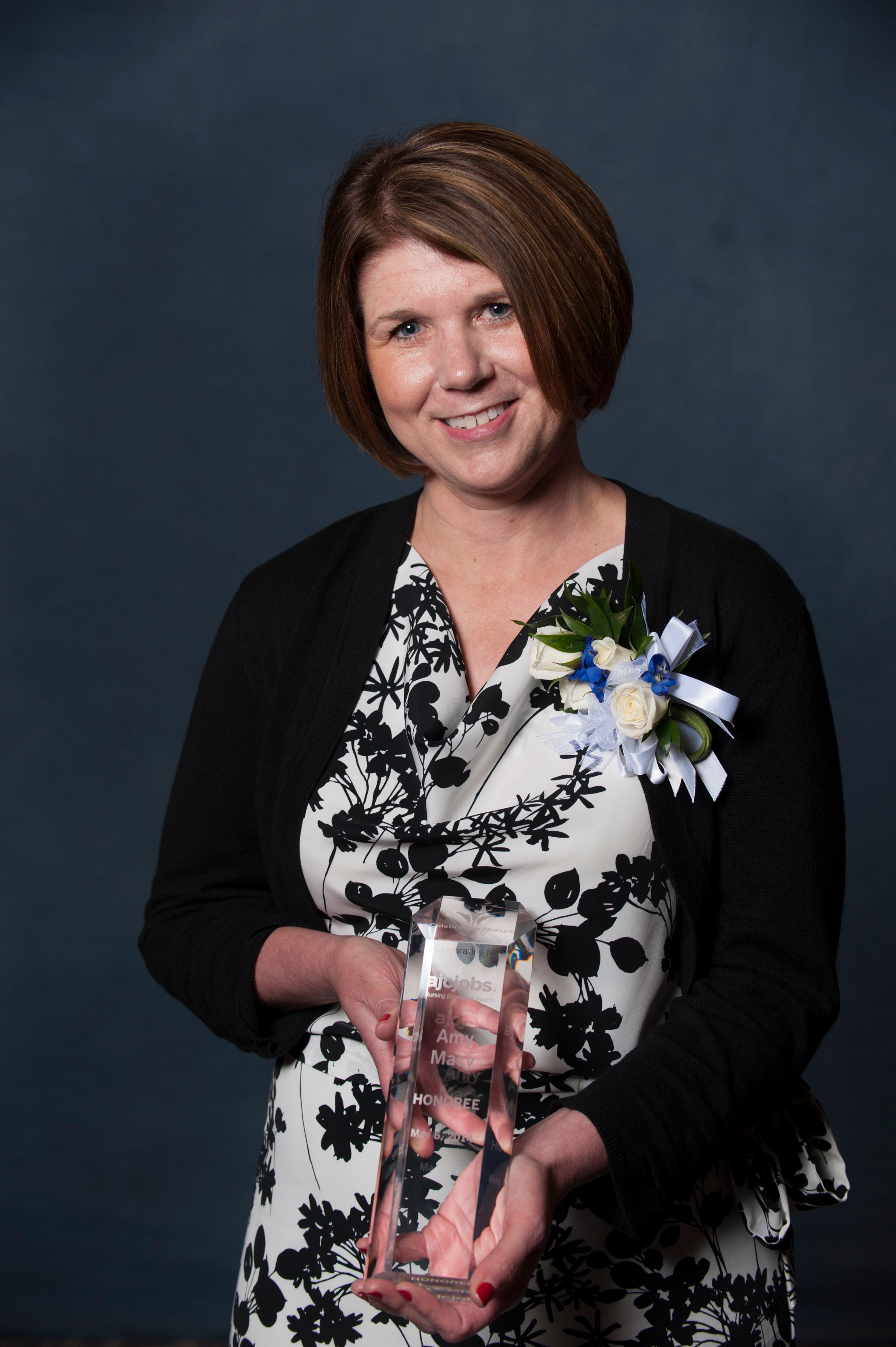 Celebrating Nurses AJC Jobs Nursing Excellence Awards winner Amy Macy pose for a portrait Tuesday, May 6, 2014 at the Cobb Galleria. (Photo by Barry Williams/Special)