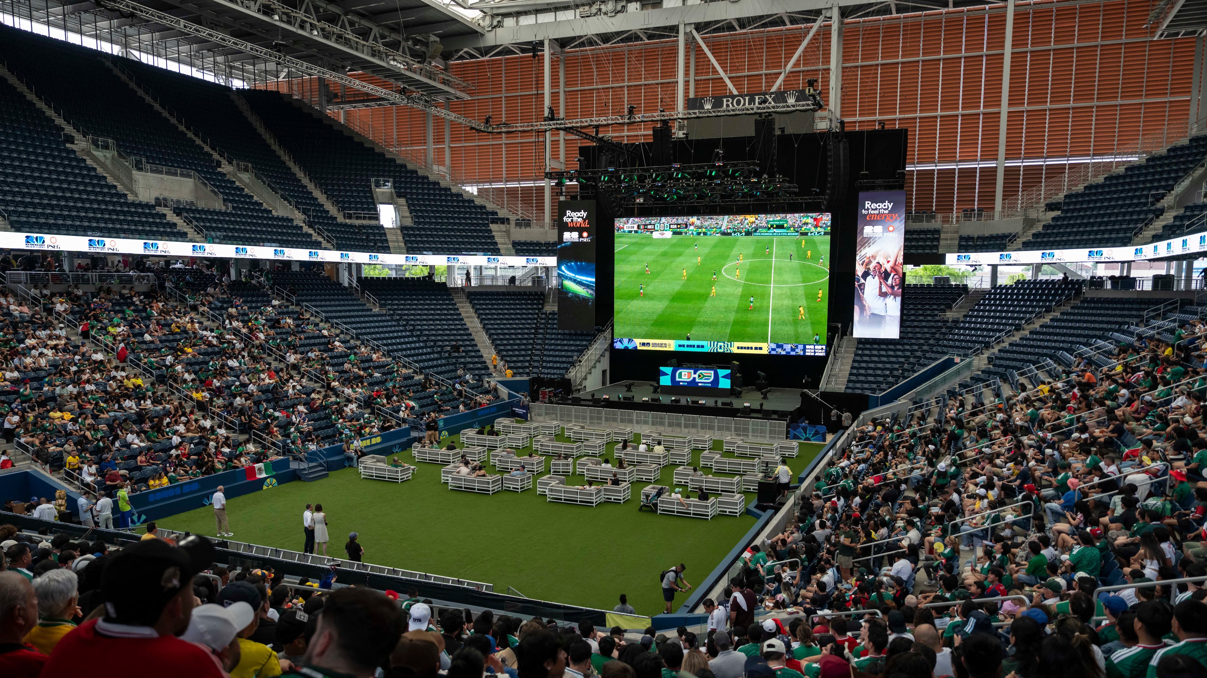 Spectators watch the opening match of the World Cup soccer tournament between Mexico and South Africa, Thursday, June 11, 2026, at the USTA Billie Jean King National Tennis Center in New York. (AP Photo/Yuki Iwamura)