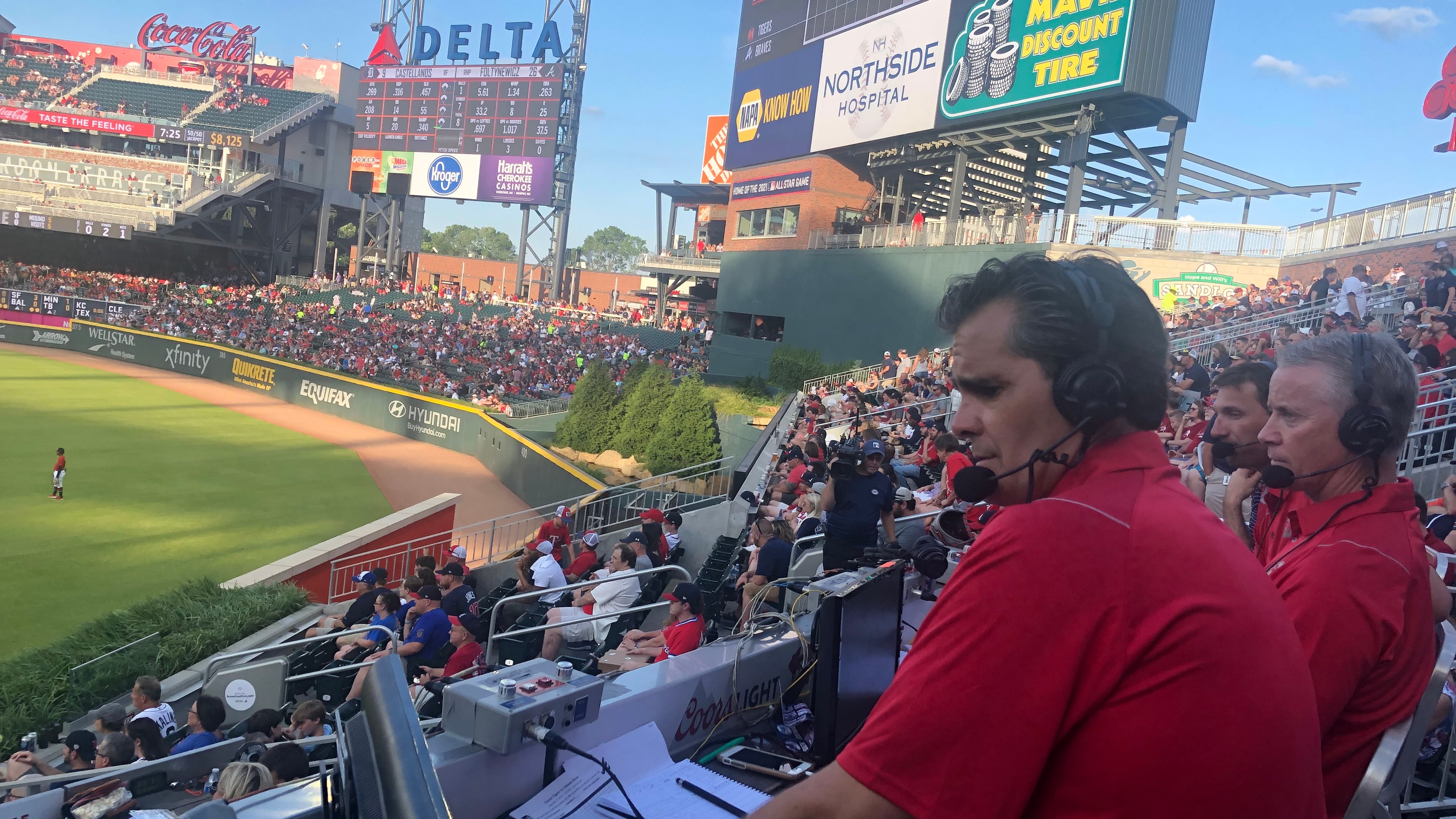 Play-by-play announcer Chip Caray (left) was joined by Tom Glavine (middle) and Jeff Francoeur for a 2019 telecast from the outfield stands at Truist Park (then named SunTrust Park). Caray and Francoeur again will broadcast from that spot for the Braves' May 26 game against the Phillies. (Bally Sports photo).