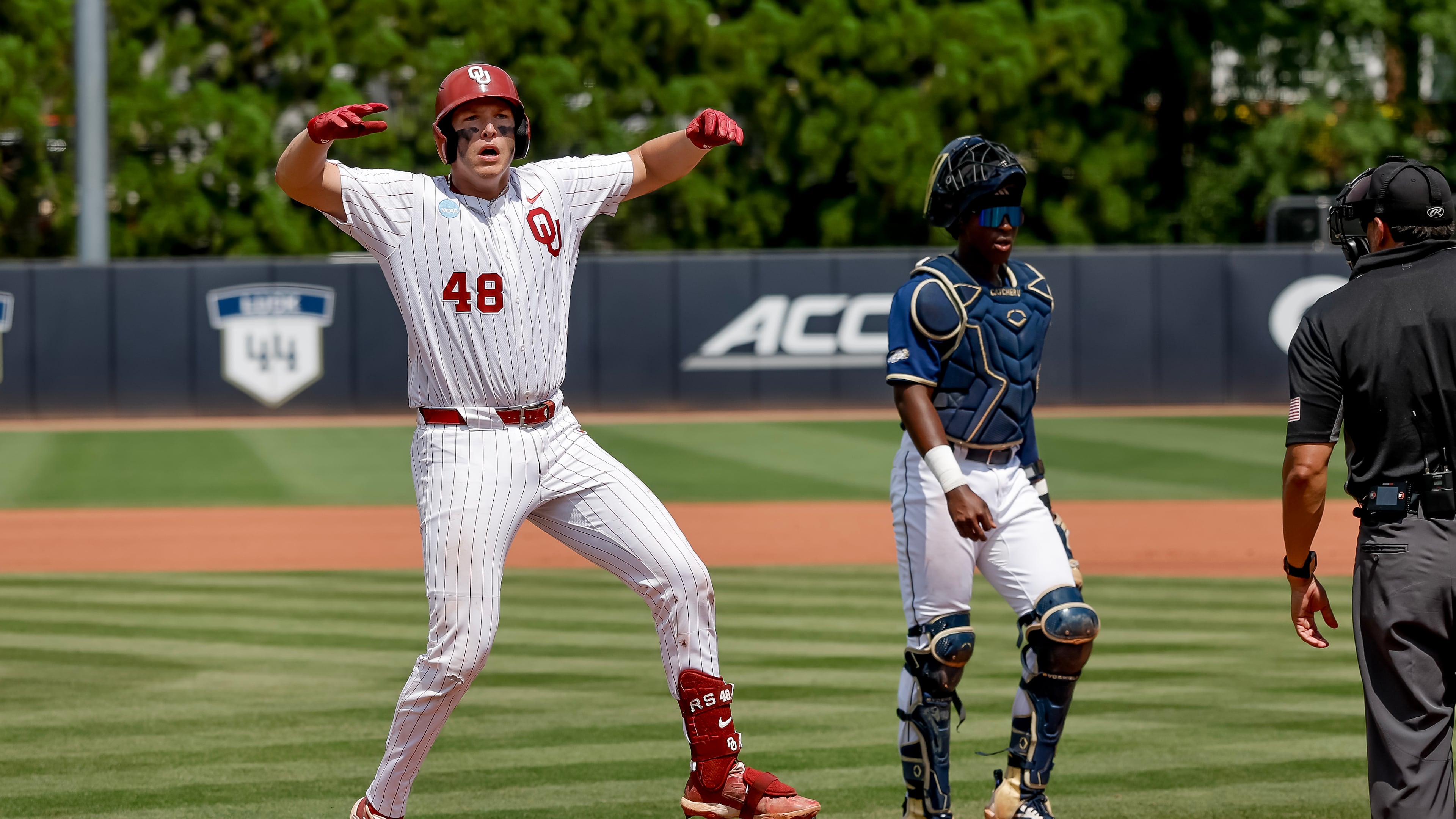 Oklahoma's Deiten Lachance (48) reacts after hitting a two-run home run as Georgia Tech catcher Vahn Lackey (25) looks on during the first inning the NCAA D1 Atlanta Regional elimination baseball game at Russ Chandler Stadium, Monday, June 1, 2026, in Atlanta. (Erik S. Lesser for the AJC)