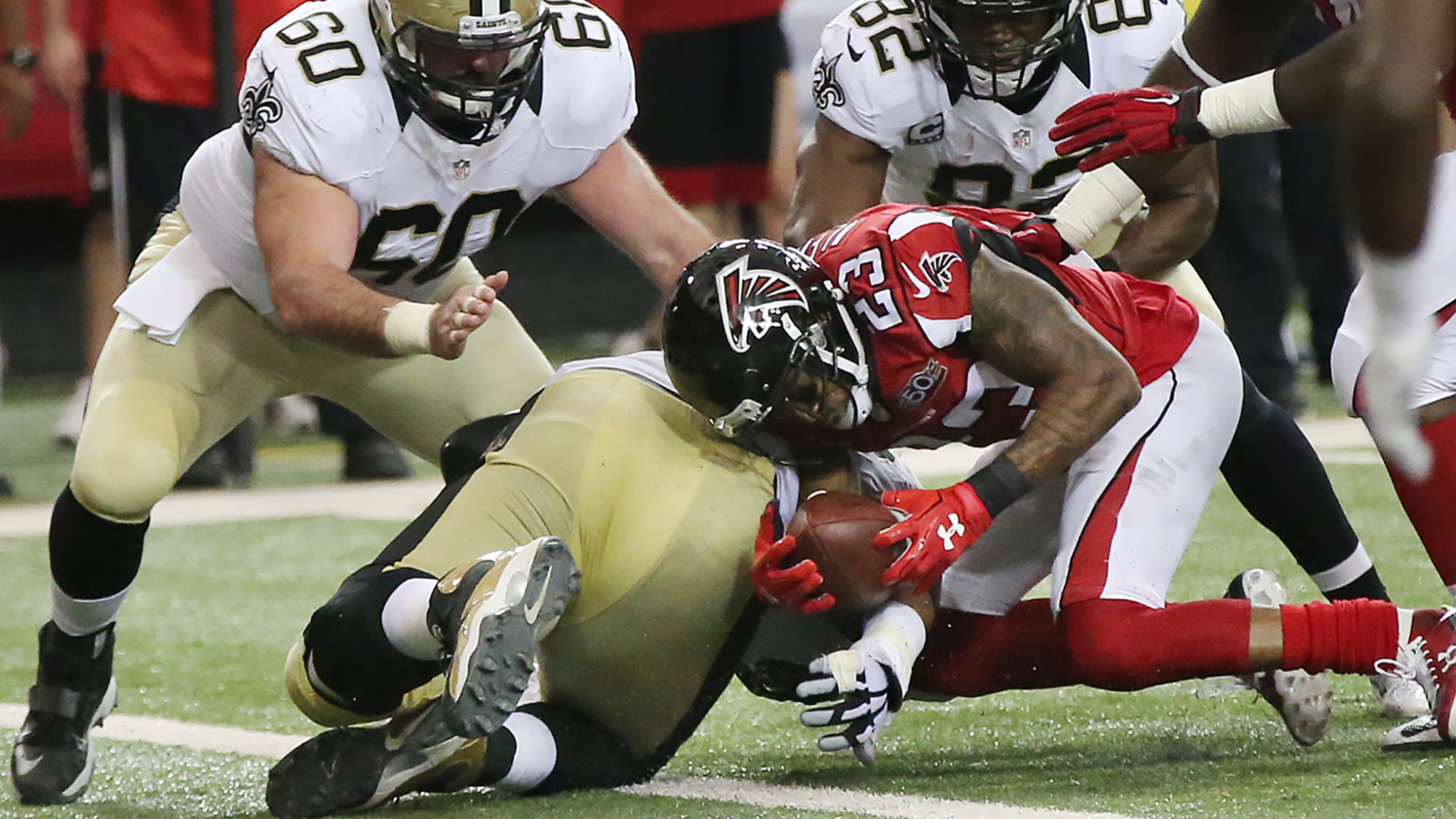 Falcons cornerback Robert Alford recovers a fumble by Saints running back Travaris Cadet at the one yard line during the fourth quarter in a January home game. Curtis Compton / ccompton@ajc.com Falcons cornerback Robert Alford recovers a fumble by Saints running back Travaris Cadet at the one yard line during the fourth quarter in a January home game. Curtis Compton / ccompton@ajc.com
