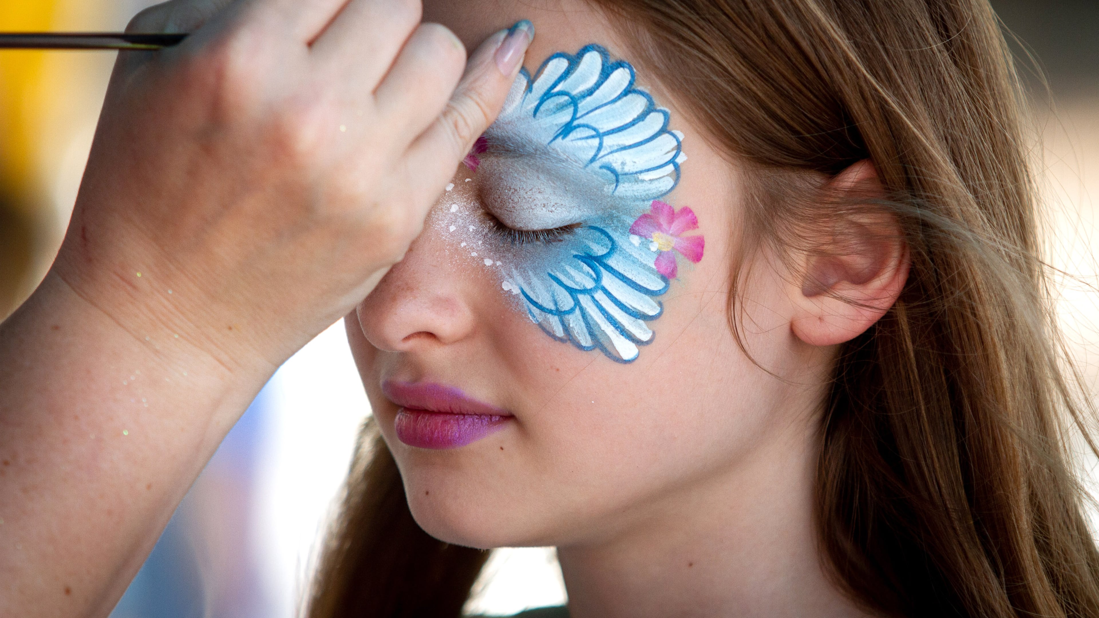 Lily Gill, 11, gets her face painted during the 29th annual Marietta Greek Festival on Saturday, May 18, 2019. STEVE SCHAEFER / SPECIAL TO THE AJC