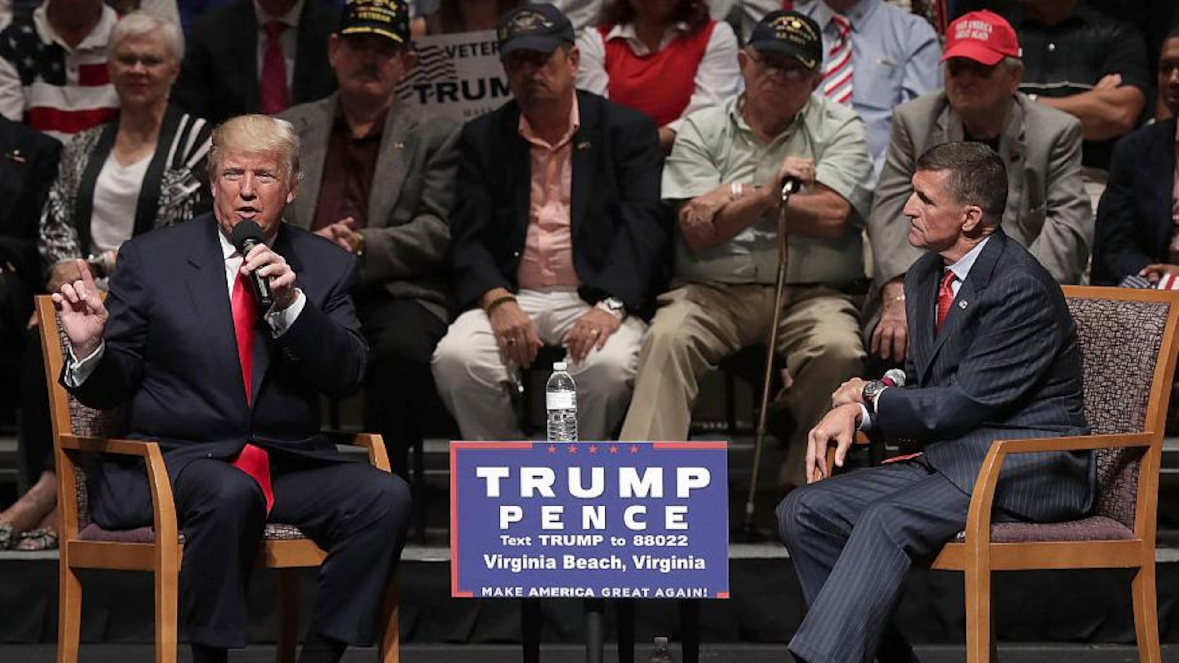 FILE PHOTO: Republican presidential nominee Donald Trump (L) speaks during a campaign event September 6, 2016 in Virginia Beach, Virginia. Trump participated in a discussion with retired Army Lieutenant General Michael Flynn (R). (Photo by Alex Wong/Getty Images)