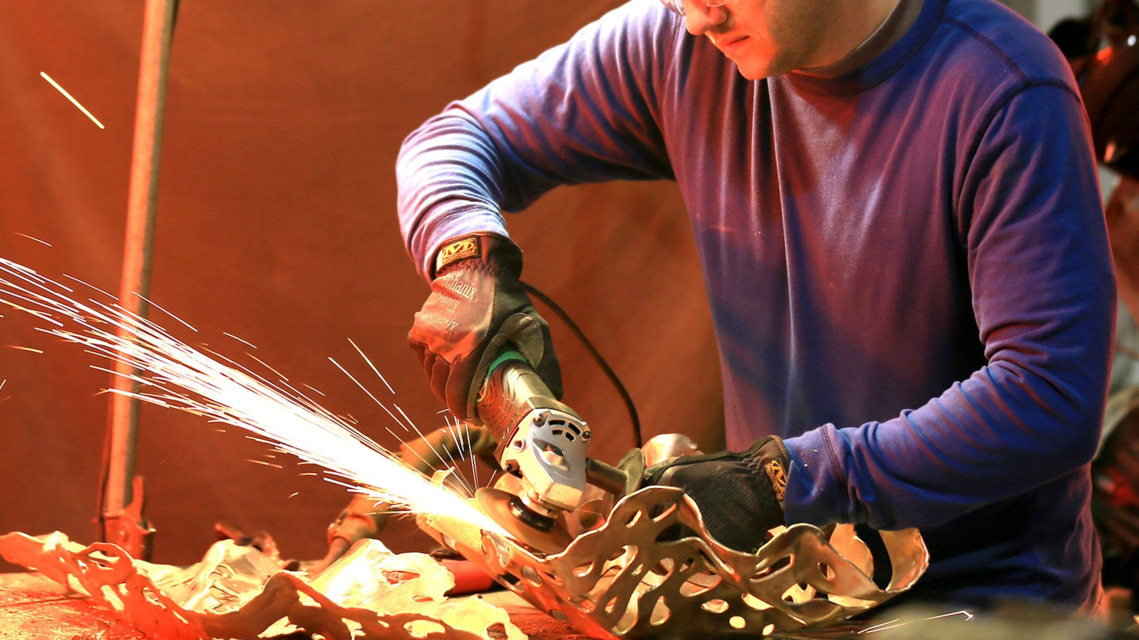 Mike Sluder, an Atlanta metal sculptor and patineur, uses a lot of fire in his very physical work. Known for his bronze castings and copper wall pieces, Sluder also does custom steel fabrication for homes. Contributed by MarkSluderPhotographs.com