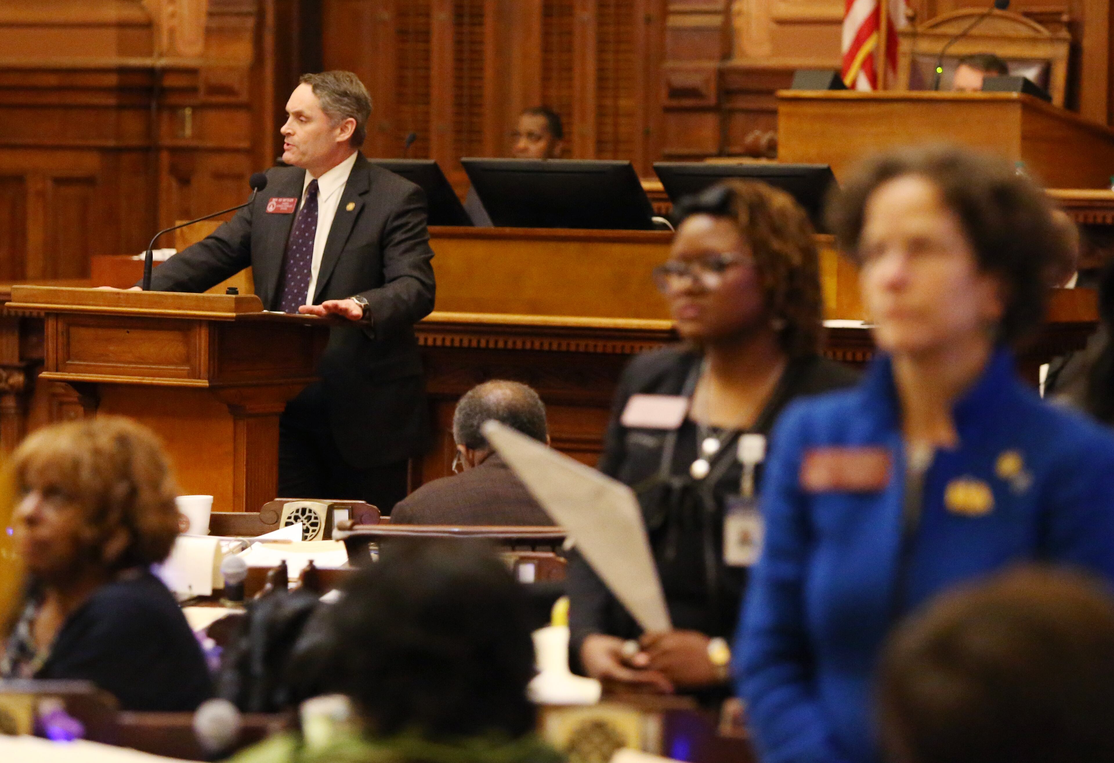 3/7/19 - Atlanta - Representatives stand with their backs towards Ed Setzler while HB 481, the "heartbeat" bill, is discussed at the Georgia State Capitol in Atlanta, Georgia on Thursday, March 7, 2019. HB 481 passed. Today was the 28th day of the General Assembly, "crossover" day. EMILY HANEY / emily.haney@ajc.com