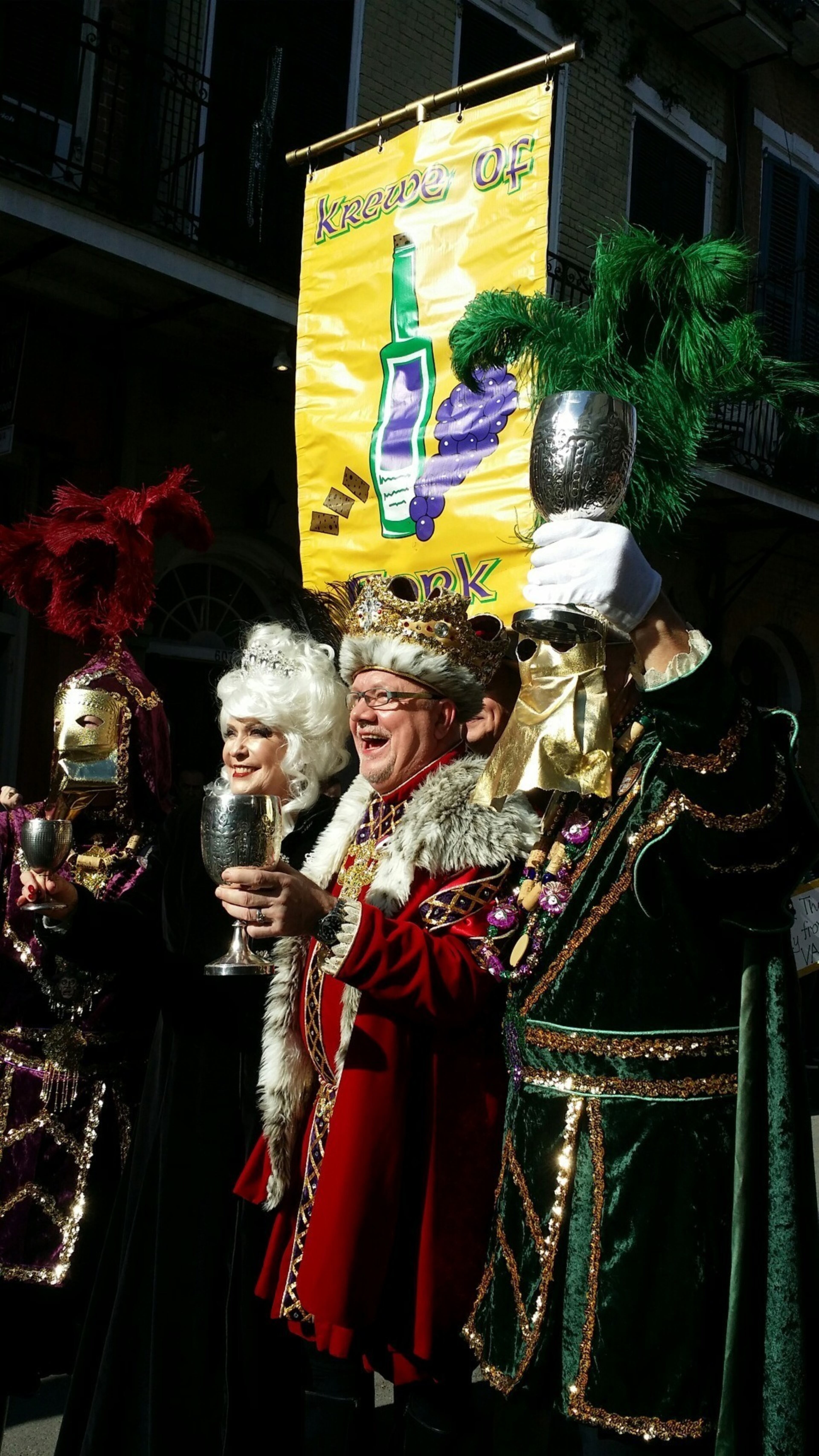 Members of the Krewe of Cork royalty pose before the beginning of their parade Friday, Feb. 2, 2018, in New Orleans. Mardi Gras season kicks into high gear this weekend. (AP Photo/Stacey Plaisance)