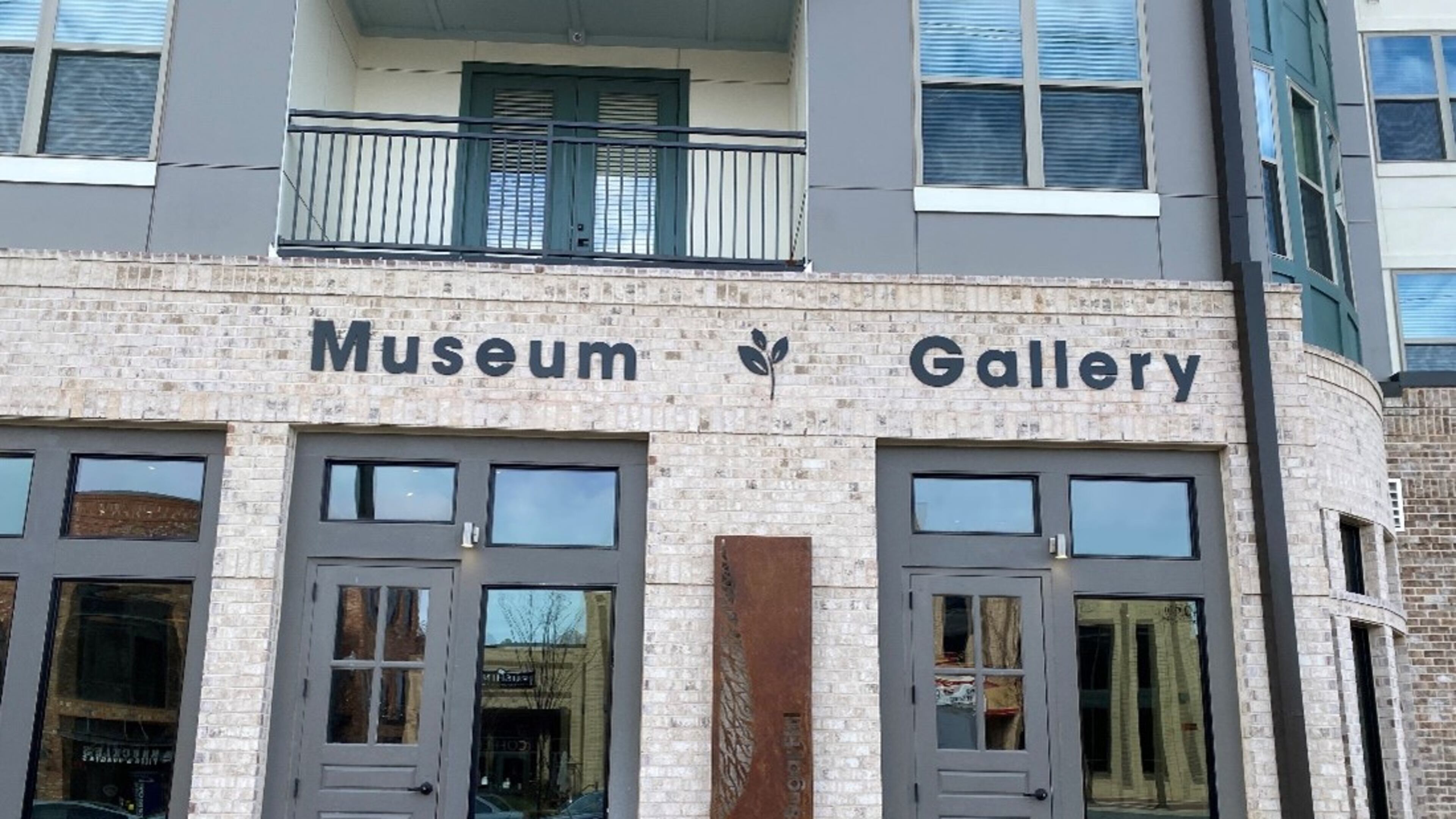 The sign between the soon to open museum and art gallery at Broadstone Sugar Hill is backlit. (Courtesy City of Sugar Hill)