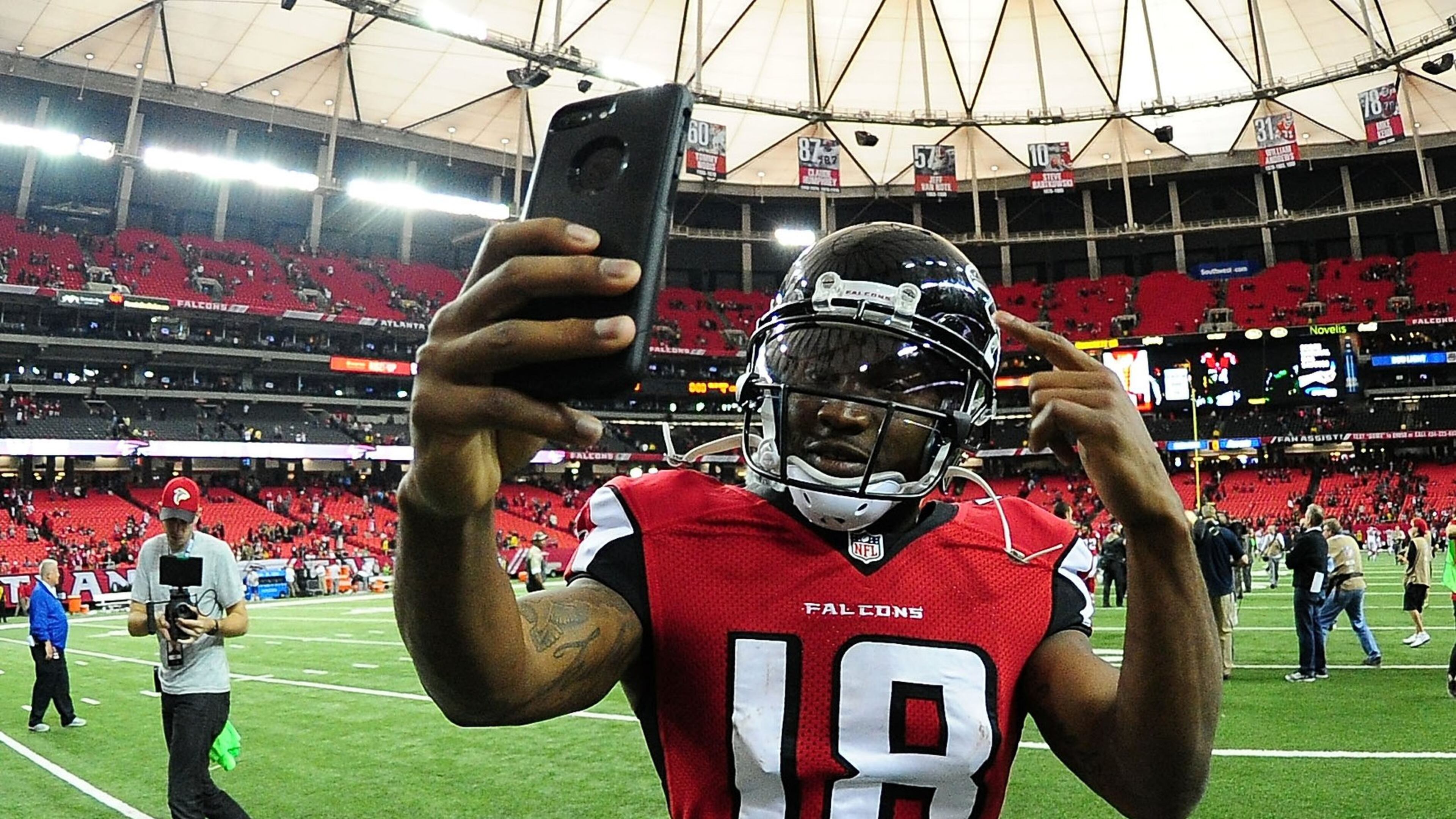 Taylor Gabriel of the Atlanta Falcons celebrates with a selfie after the game against the Arizona Cardinals at the Georgia Dome on Nov. 27, 2016, in Atlanta, Ga. (Photo by Scott Cunningham/Getty Images)