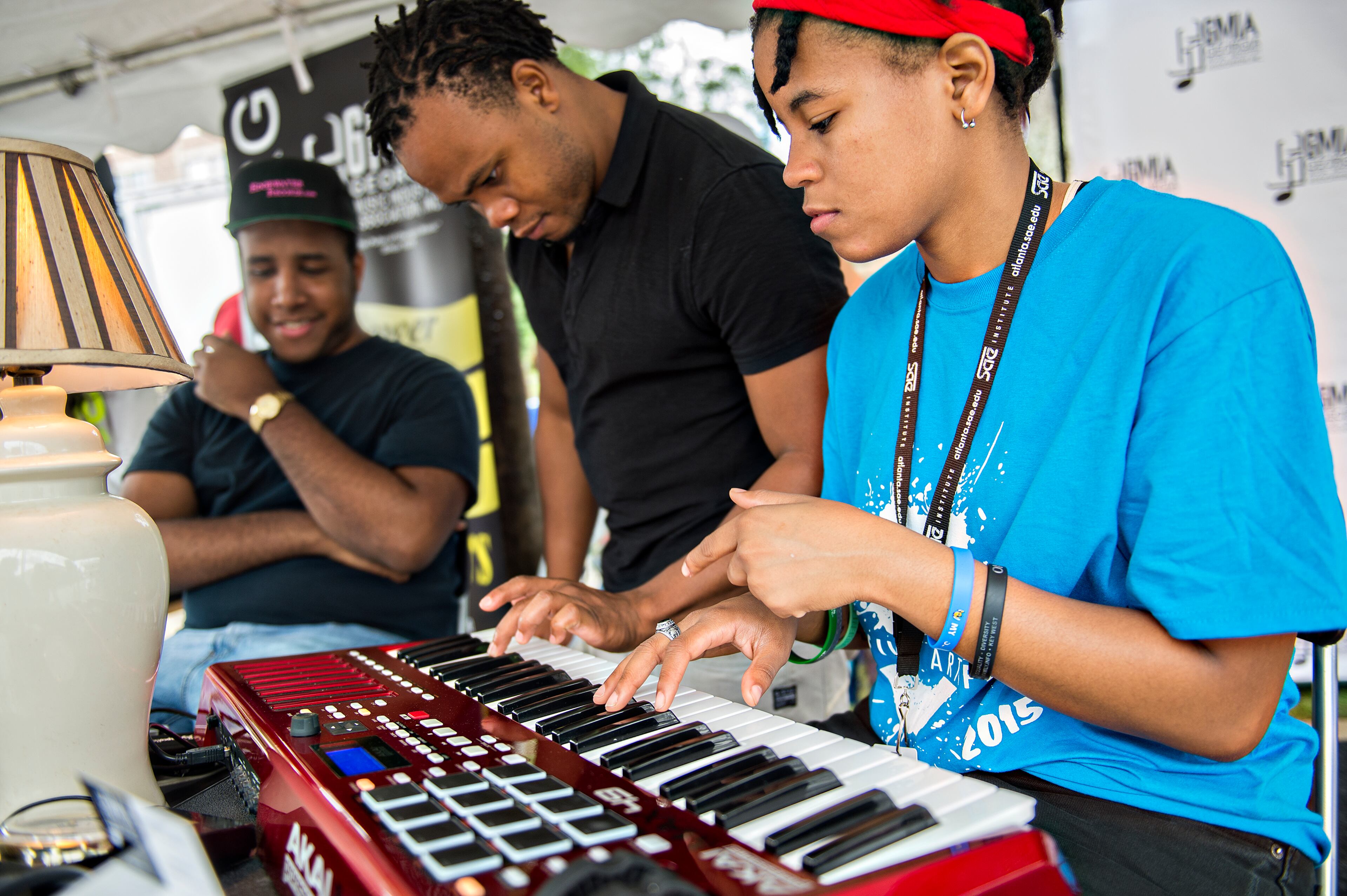 September 12, 2015 Atlanta - Jodie Ramirez (right), Ron Hinds and Sherman Trotz lay down a keyboard track at the GMIA recording studio during the 5 Arts Fest in the Little Five Points neighborhood of Atlanta on Saturday, September 12, 2015. In its second year, the 5 Arts Fest brings together the community to participate in literary, visual, recording and performing arts as well as arts and crafts projects. JONATHAN PHILLIPS / SPECIAL