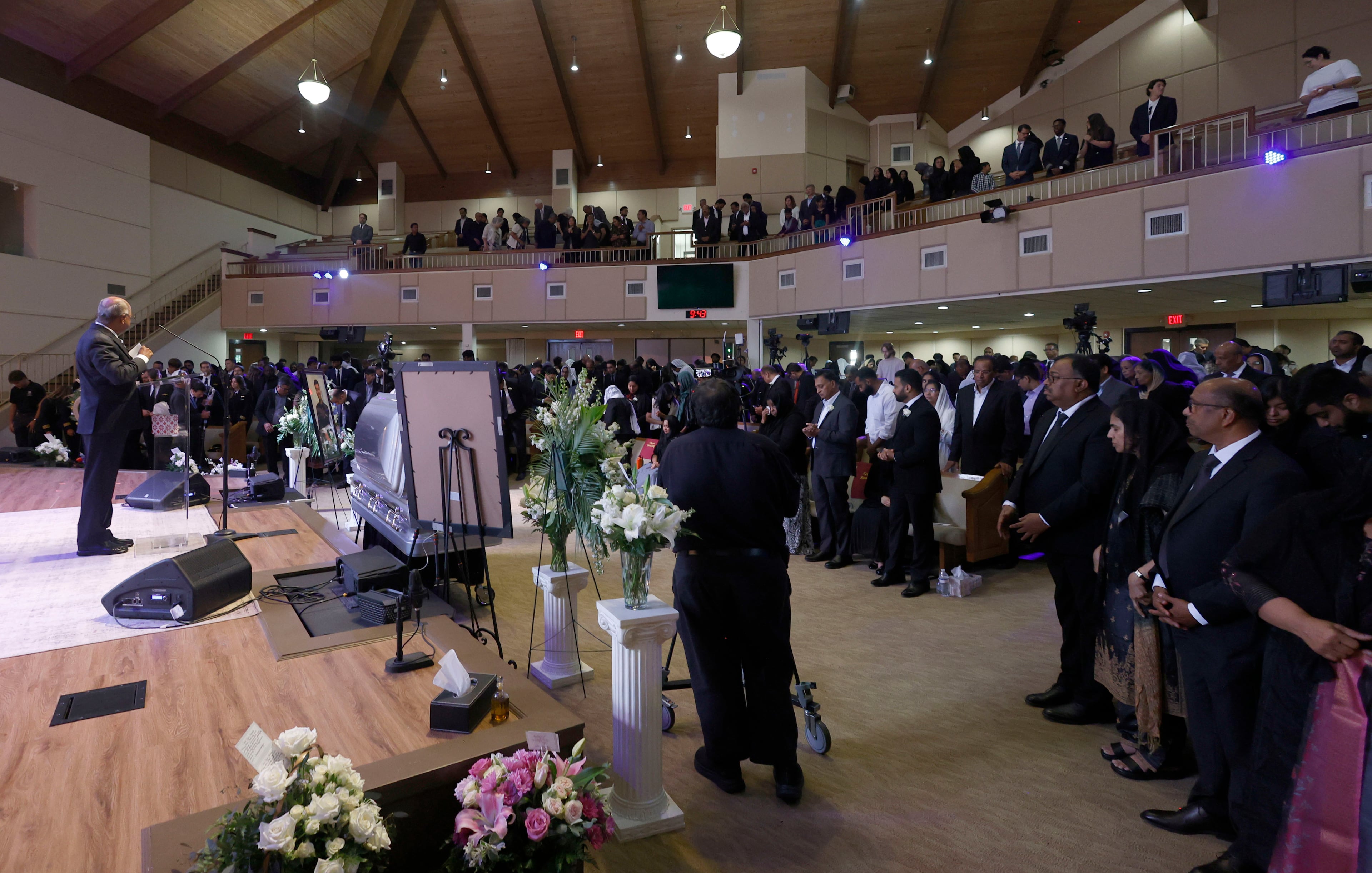 Dave Fiji's funeral on June 6, 2026, was attended by hundreds of family members and friends. He lay in a silver casket that was left open during the entire service. (Akili-Casundria Ramsess for the AJC)
