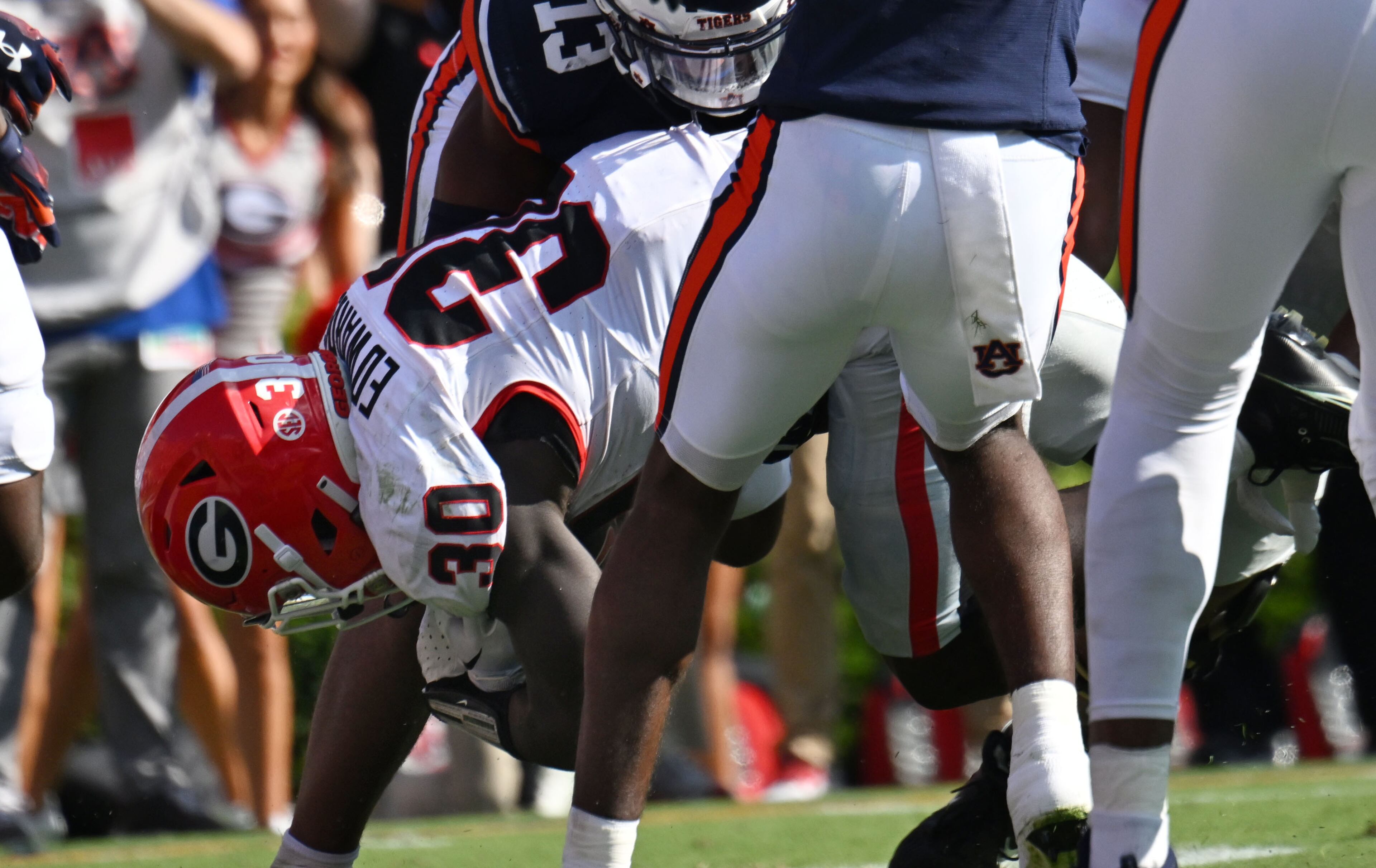 Georgia running back Daijun Edwards falls into the end zone for a touchdown during the first half in an NCAA football game against Auburn at Jordan-Hare Stadium, Saturday, Sept. 30, 2023, in Auburn, Alabama. (Hyosub Shin / Hyosub.Shin@ajc.com)