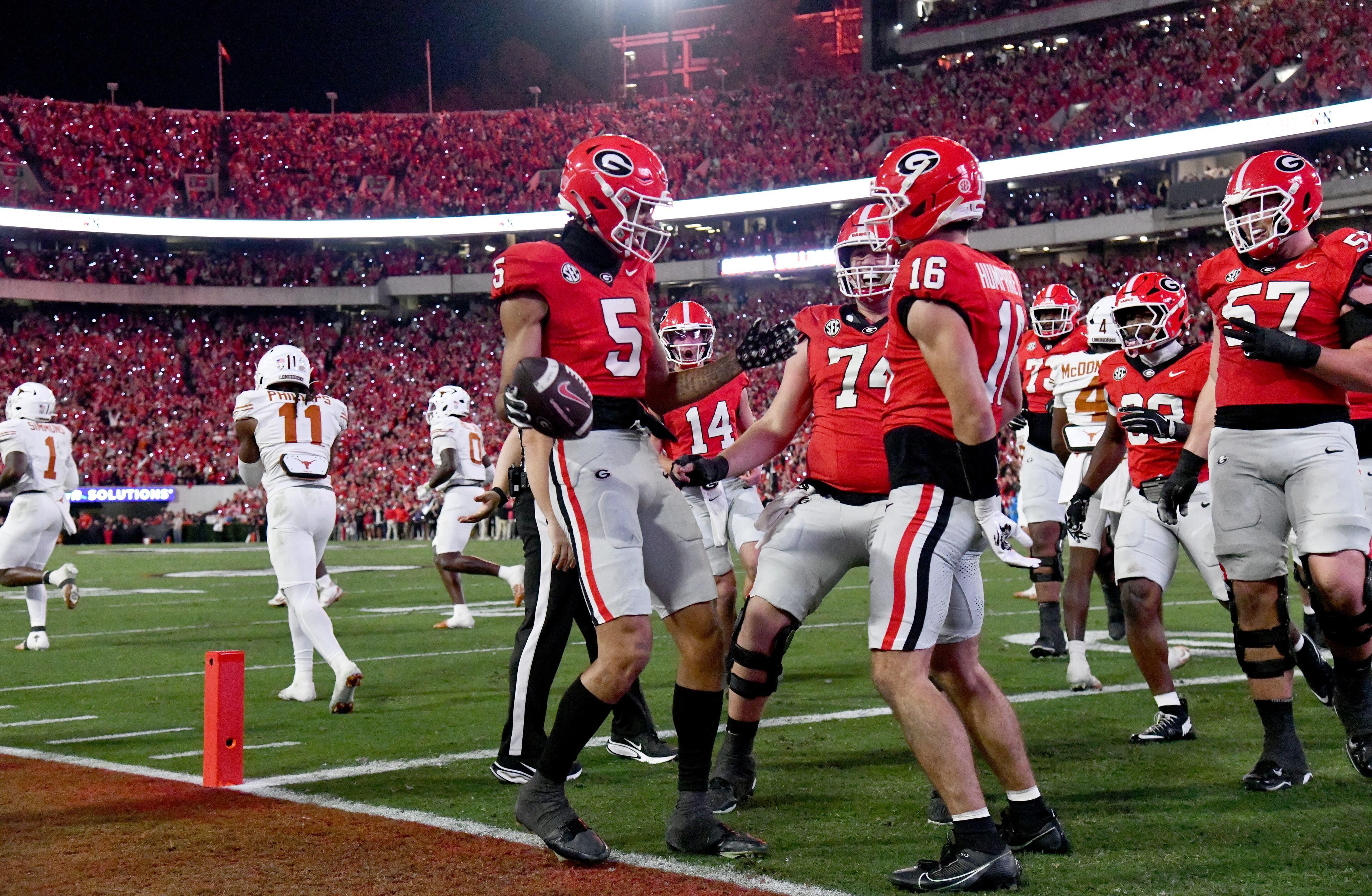 Georgia wide receiver Noah Thomas (5) celebrates after scoring a touchdown during the first half in an NCAA football game at Sanford Stadium, Saturday, November 15, 2025, in Athens. (Hyosub Shin / AJC)