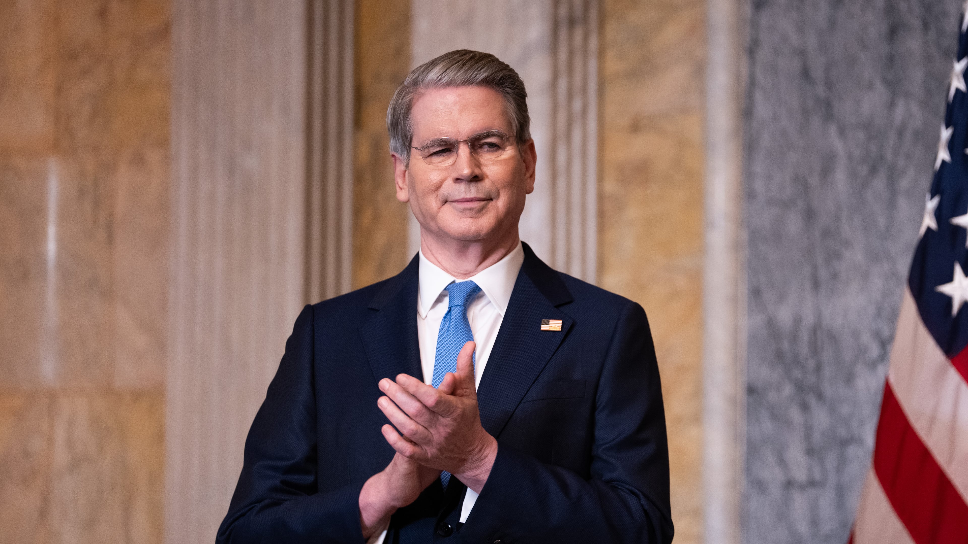 Treasury Secretary Scott Bessent applauds during an event about Trump Accounts for children in foster care at the Department of Treasury, Thursday, June 11, 2026, in Washington. (AP Photo/Allison Robbert)