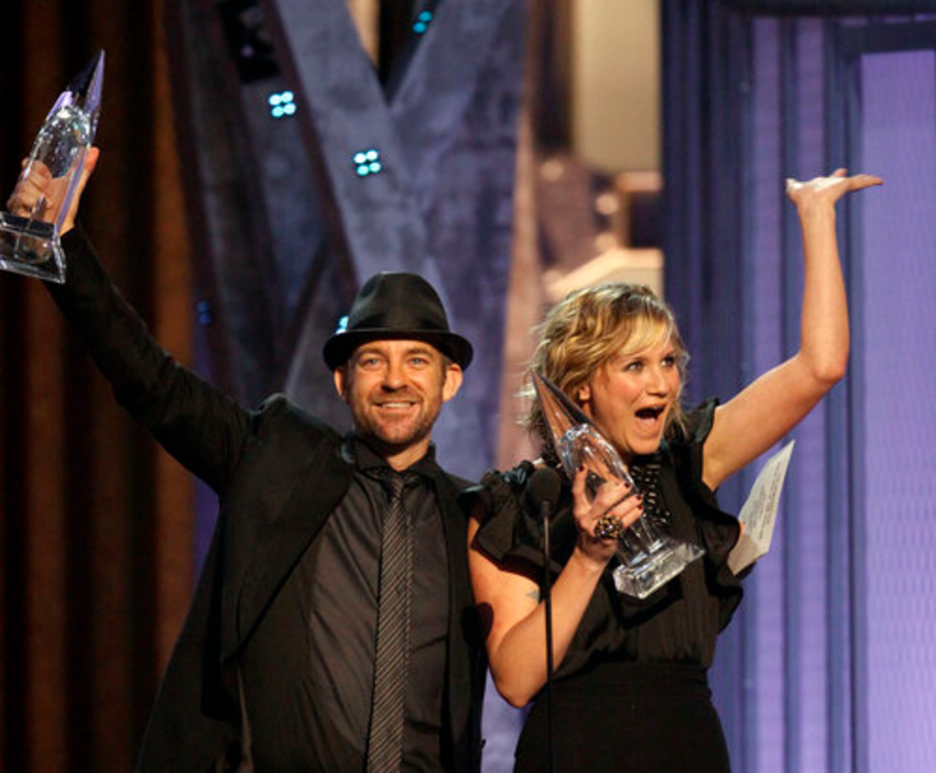 Kristian Bush (left) and Jennifer Nettles of the band Sugarland accept the Vocal Duo of the Year award.