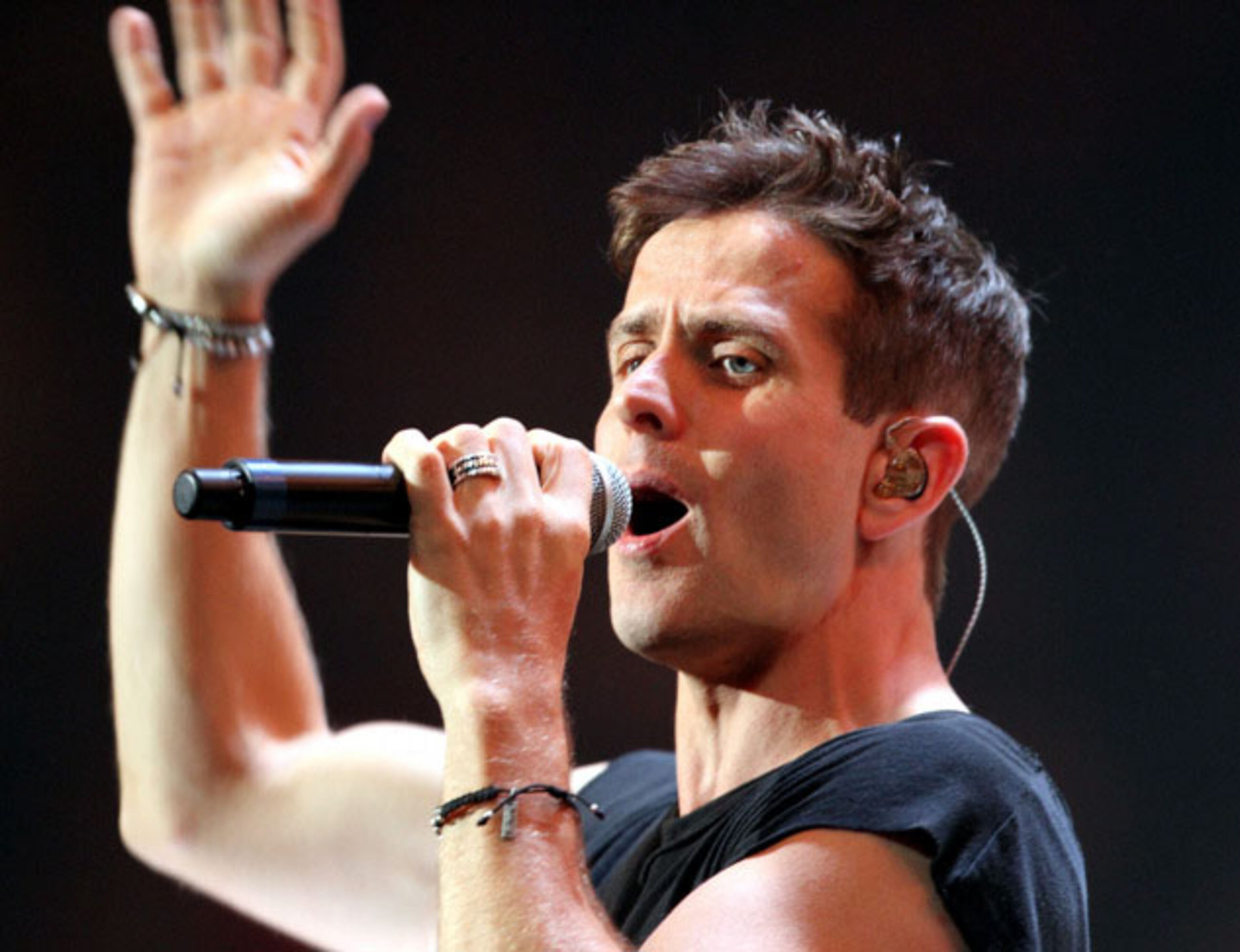 Joey McIntyre sings "Crash." Boy band New Kids on the Block (also initialized as NKOTB) brought their "Main Event" tour to Philips Arena in Atlanta on Saturday, June 6, 2015, with TLC and Nelly as supporting acts. NKOTB were formed in 1984 in Boston by Maurice Starr, who had discovered New Edition, and went on to sell in excess of 80 million records worldwide. Robb D. Cohen/RobbsPhotos.com