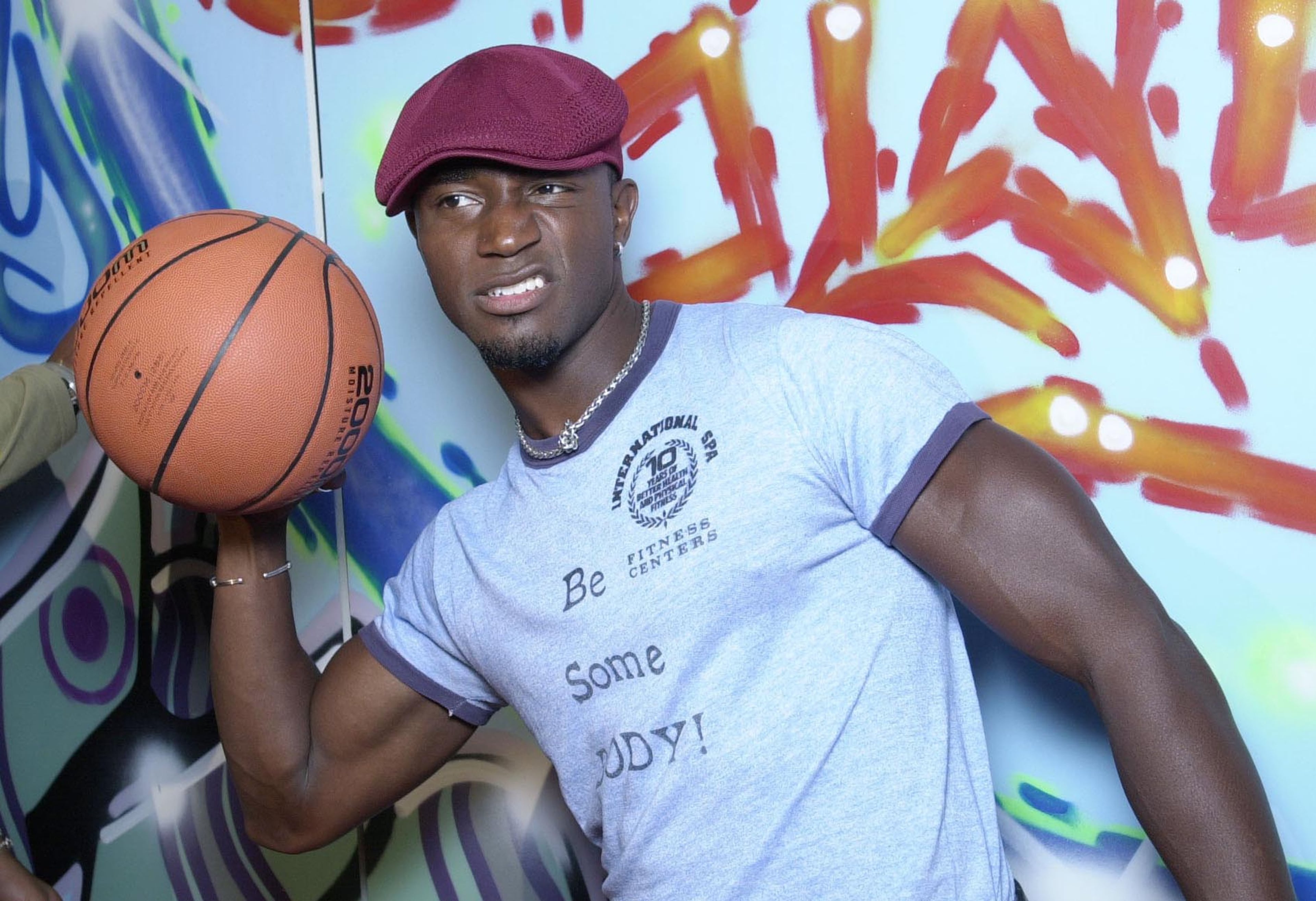 392728 11: Actor Taye Diggs poses with a basketball at the kickoff of Nike Playoff Festivals August 1, 2001 at Niketown in Los Angeles, CA. (Photo by Harry How/Getty Images)