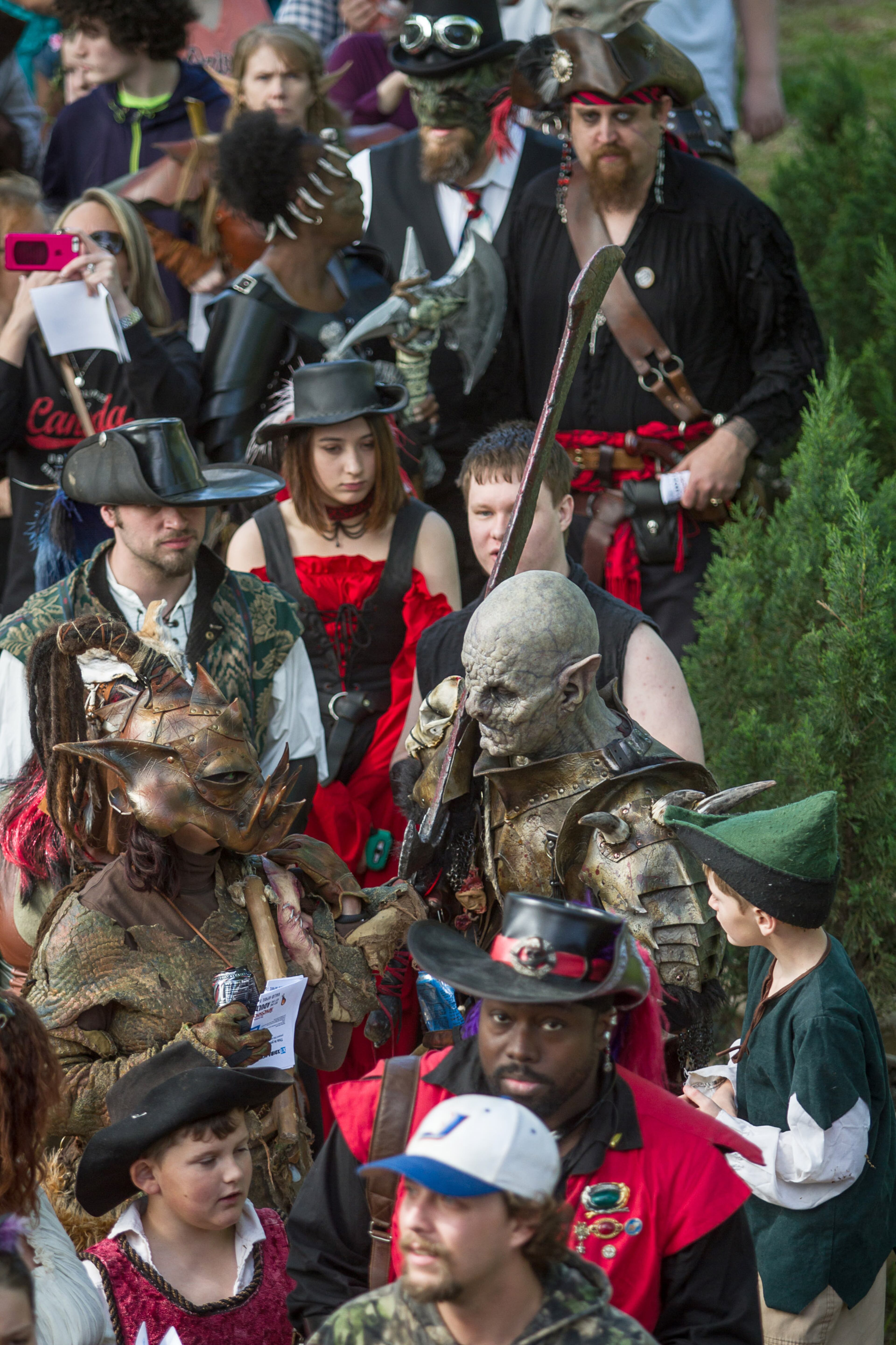 A large crowd, dressed in costumes, gather before the gates open on the first day of the Georgia Renaissance Festival in Fairburn, Ga. Saturday April 16, 2016. STEVE SCHAEFER / SPECIAL TO THE AJC
