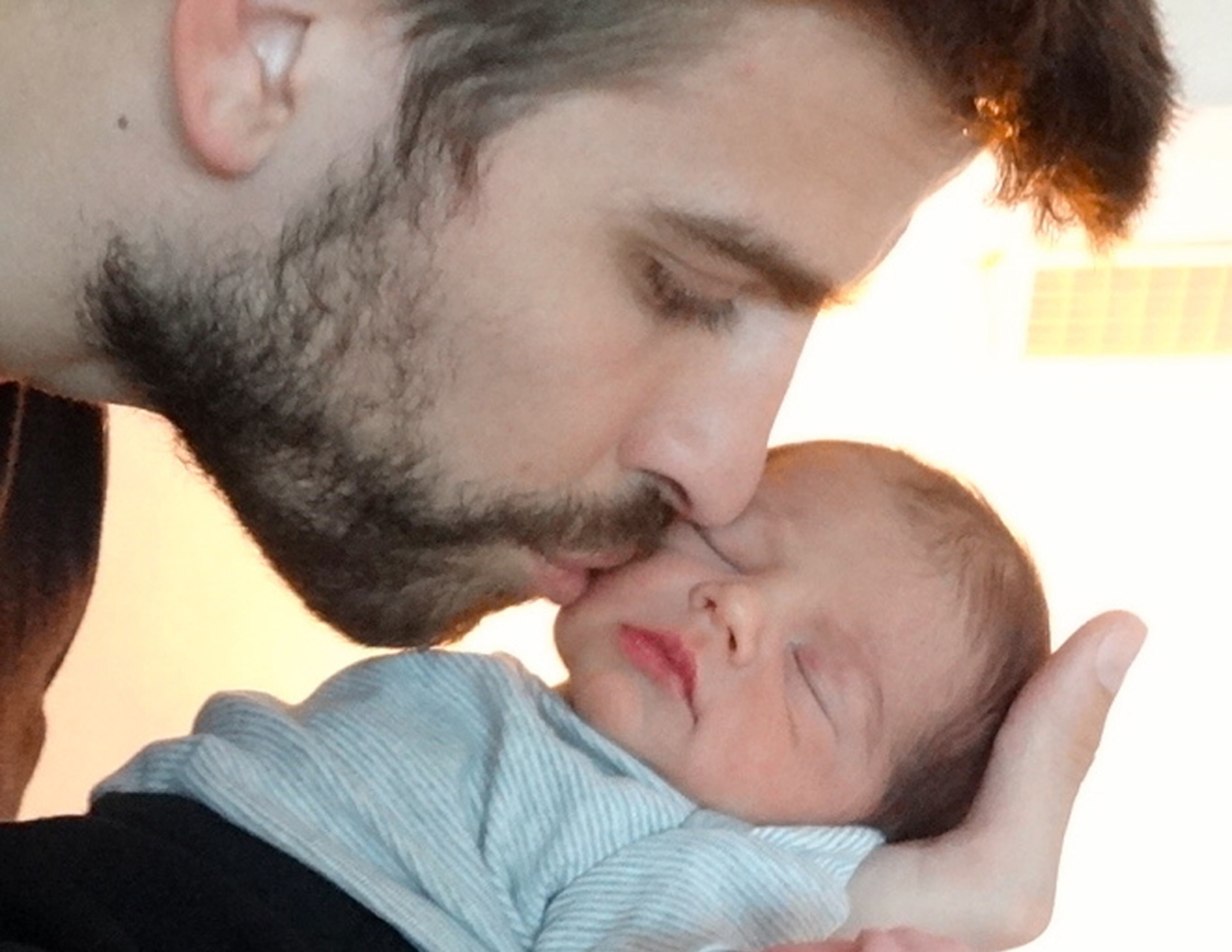 THE PICS DON'T LIE: Shakira is sharing the first public photograph of her recently born baby, with father Gerard Pique planting a kiss on his infant son's cheek. The 36-year-old Colombian singer announced on Twitter that the photo of "my two angels" could be seen on the website of UNICEF. She has urged people to donate to a baby shower on behalf of needy children helped by the U.N. children's agency.