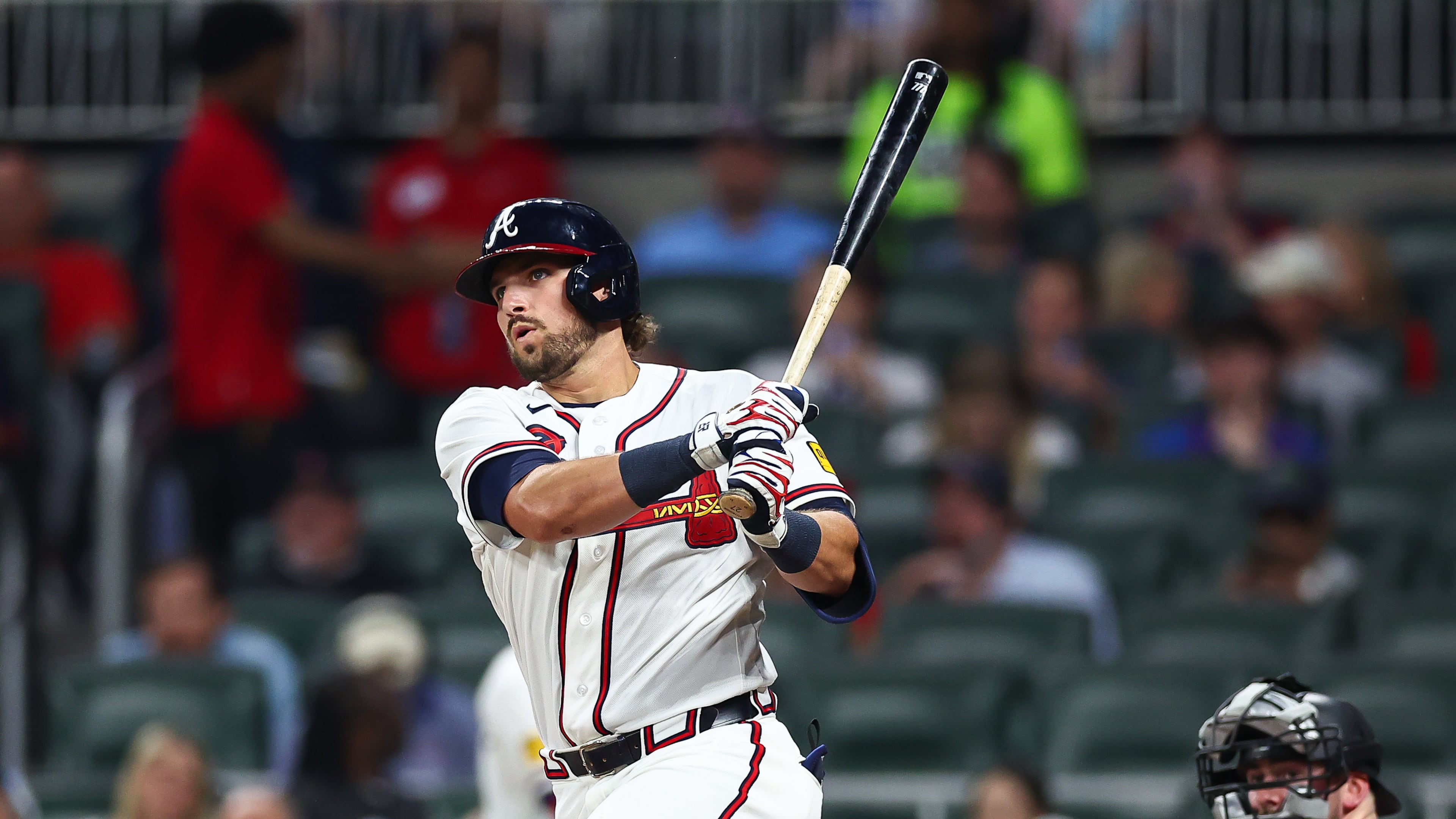 Atlanta Braves' Austin Riley hits an RBI single in the fourth inning of a baseball game against the Miami Marlins, Monday, April 13, 2026, in Atlanta. (AP Photo/Colin Hubbard)