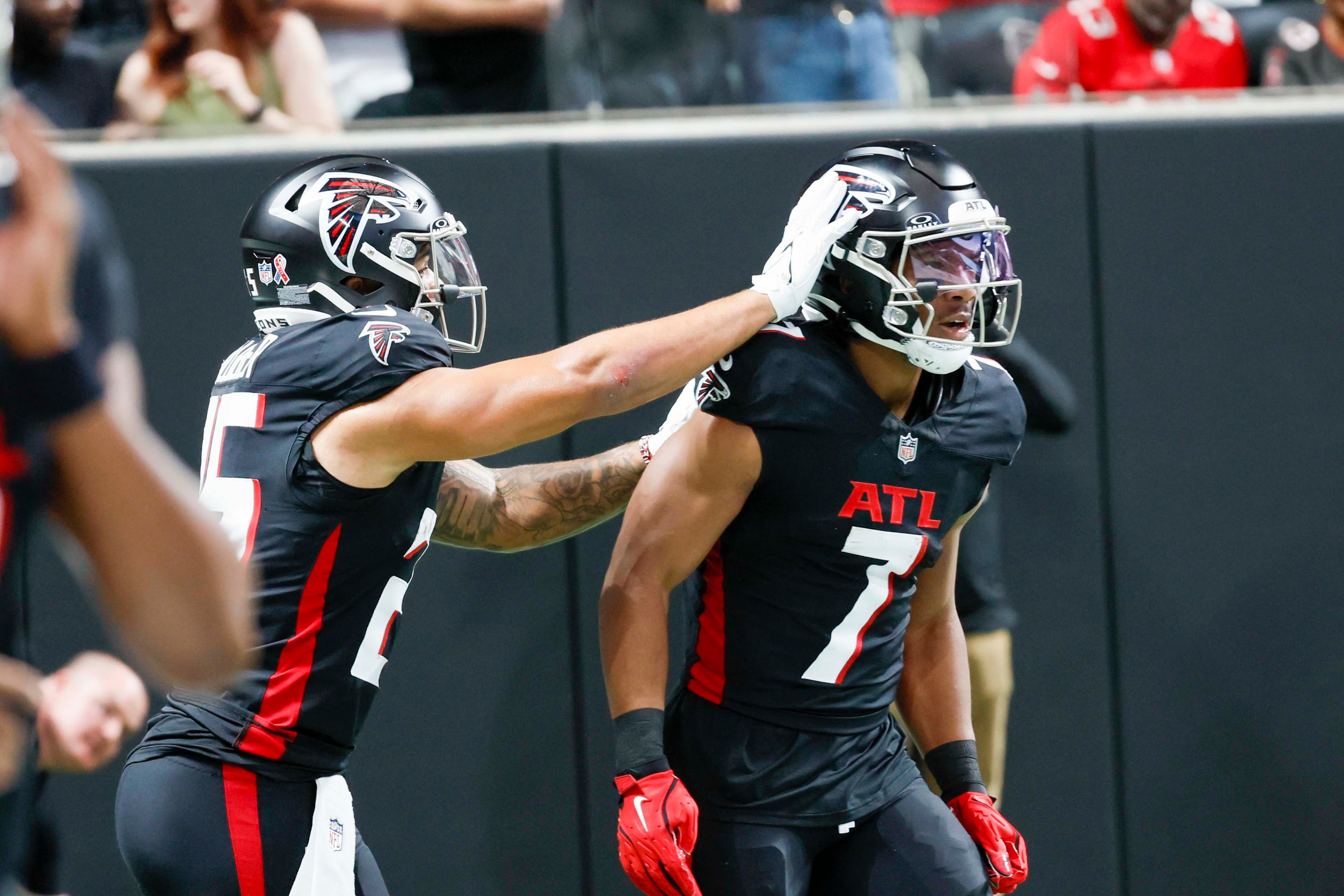 Atlanta Falcons running back Tyler Allgeier (25) celebrates with Falcons running back Bijan Robinson (7) after his touchdown during the first half of an NFL game against the Tampa Bay Buccaneers at Mercedes-Benz Stadium on Sunday, September 7, 2025, in Atlanta.
(Miguel Martinez/ AJC)