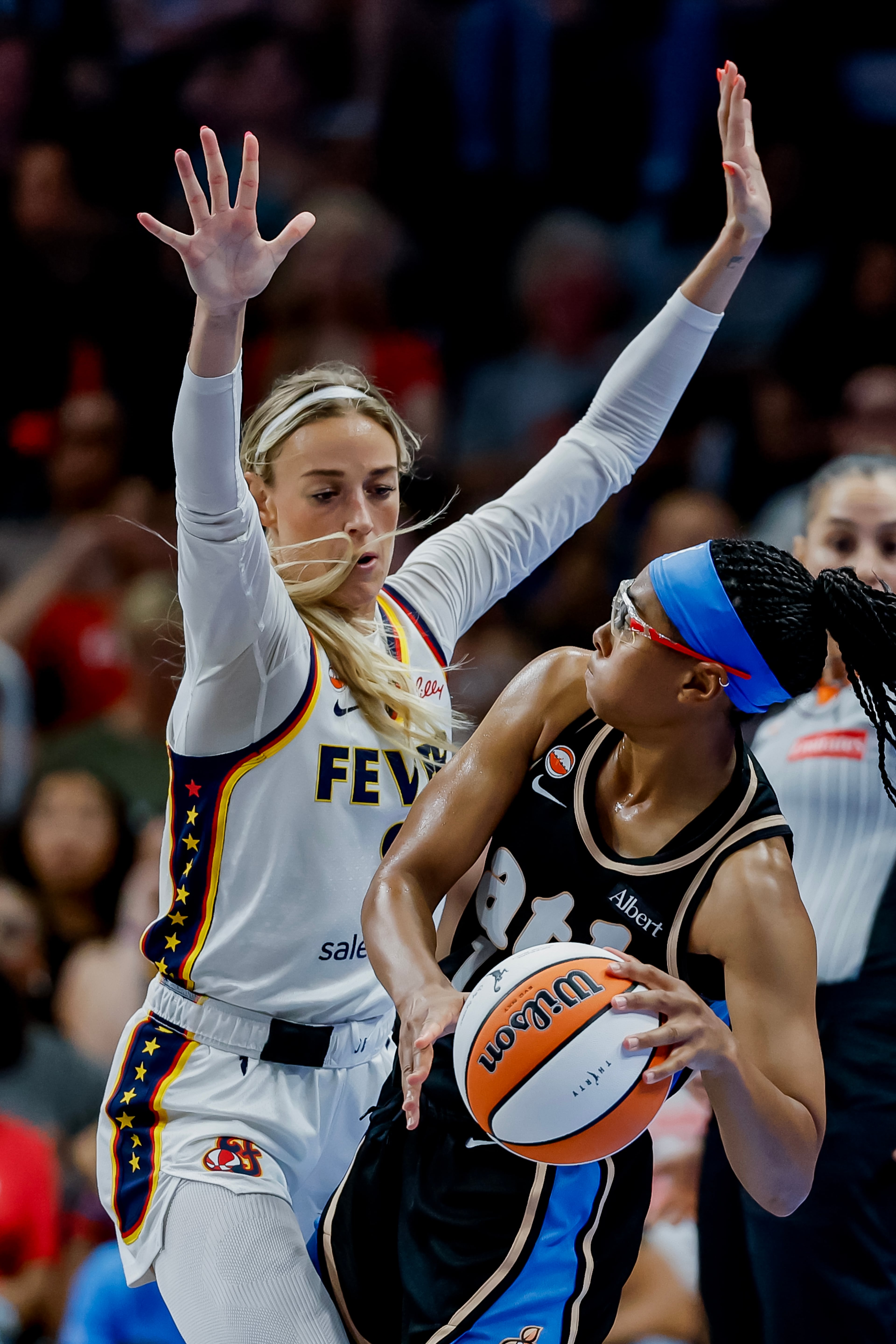 Indiana Fever guard Sophie Cunningham (left) defends against Atlanta Dream guard Allisha Gray. (Erik S. Lesser for the AJC)