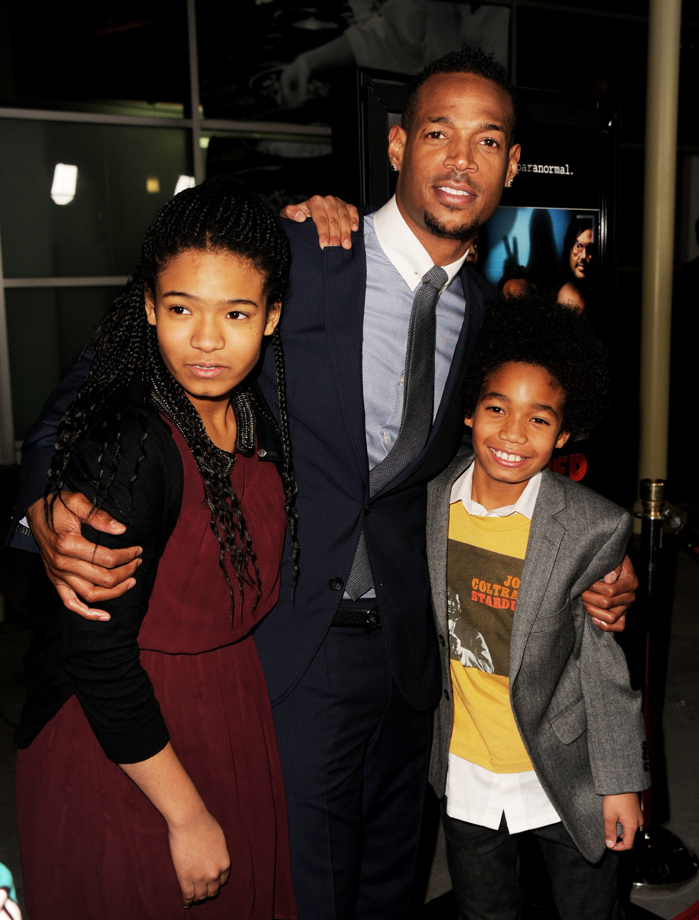 Co-writer/producer/actor Marlon Wayans (C) and his daughter Amai and son Shawn pose at the premiere of Open Road Films' "A Haunted House" at the Arclight Theatre on January 3, 2013 in Los Angeles, California.