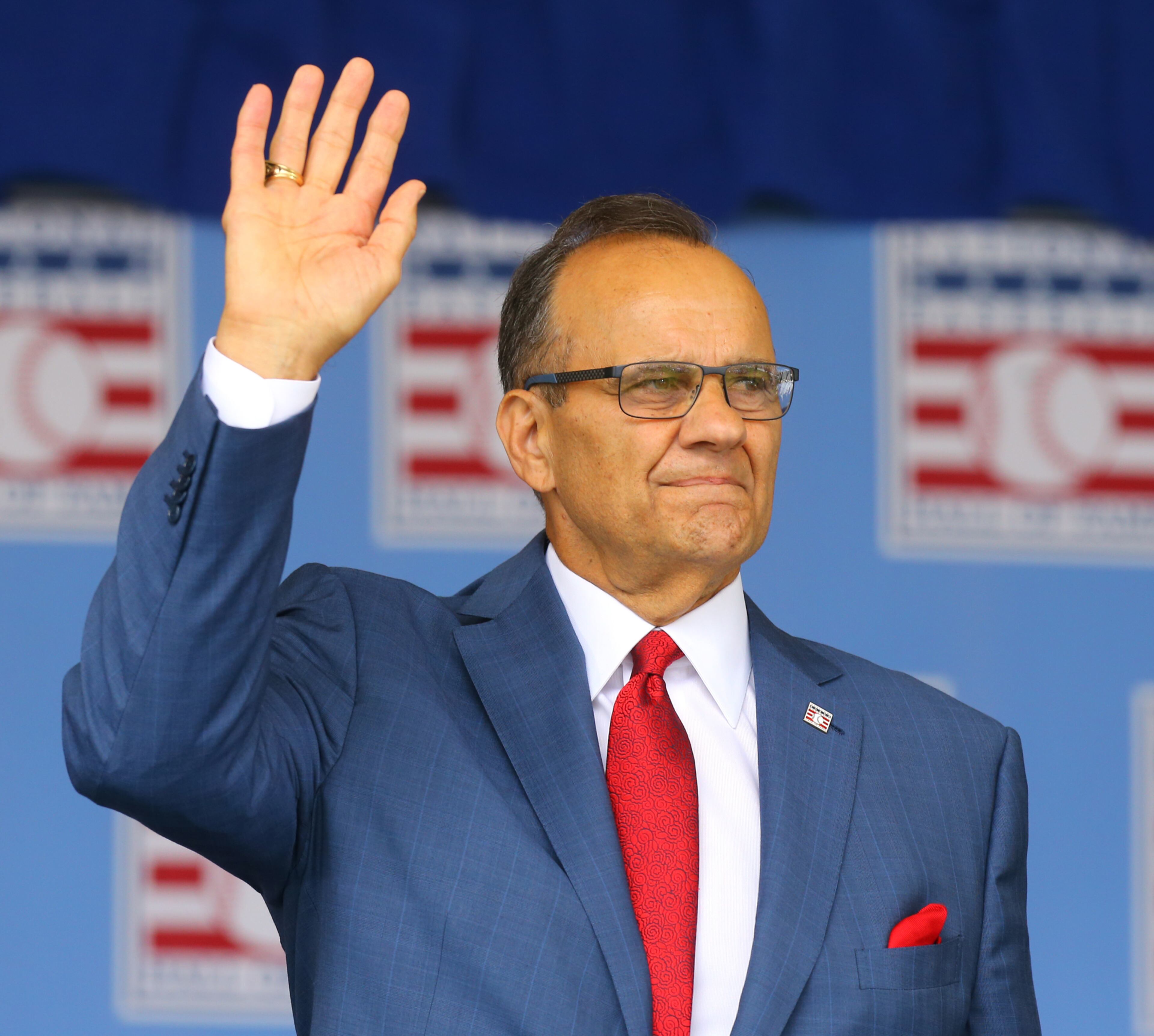 Joe Torre waves to fans as he is introduced during the National Baseball Hall of Fame Induction Ceremony. CURTIS COMPTON / CCOMPTON@AJC.COM