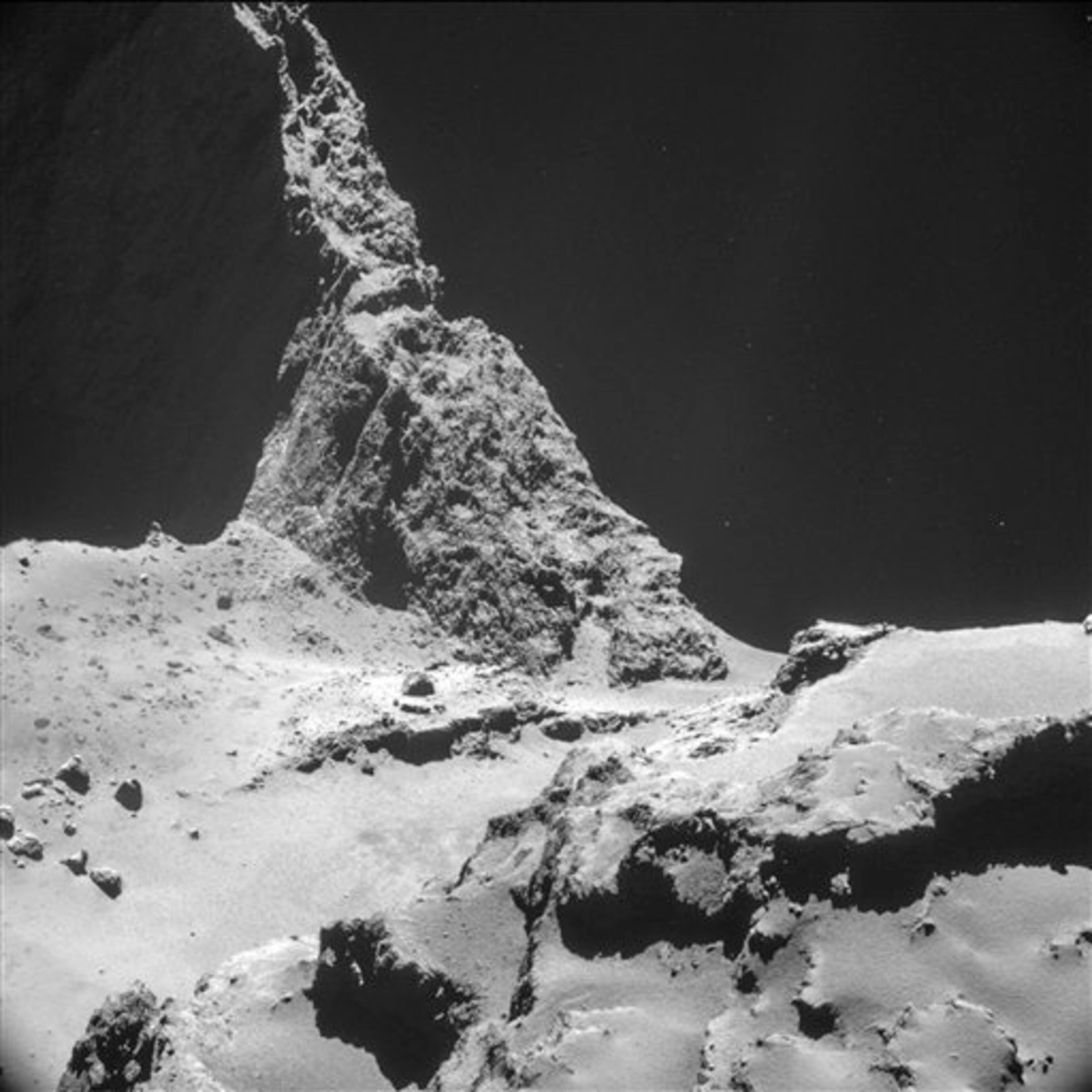 The picture taken with the navigation camera on Rosetta and released by the European Space Agency ESA shows the boulder-strewn neck region of Comet 67P/Churyumov�Gerasimenko, with the smaller lobe on the left and the larger lobe on the right. It was captured from a distance of 9.7 km from the center of the comet (about 7.7 km / 4.8 miles) from the surface) on Oct. 28, 2014. On Wednesday, Nov. 12, 2014 the Philae lander will be detached from Rosetta to land on the comet. (AP Photo/ESA)