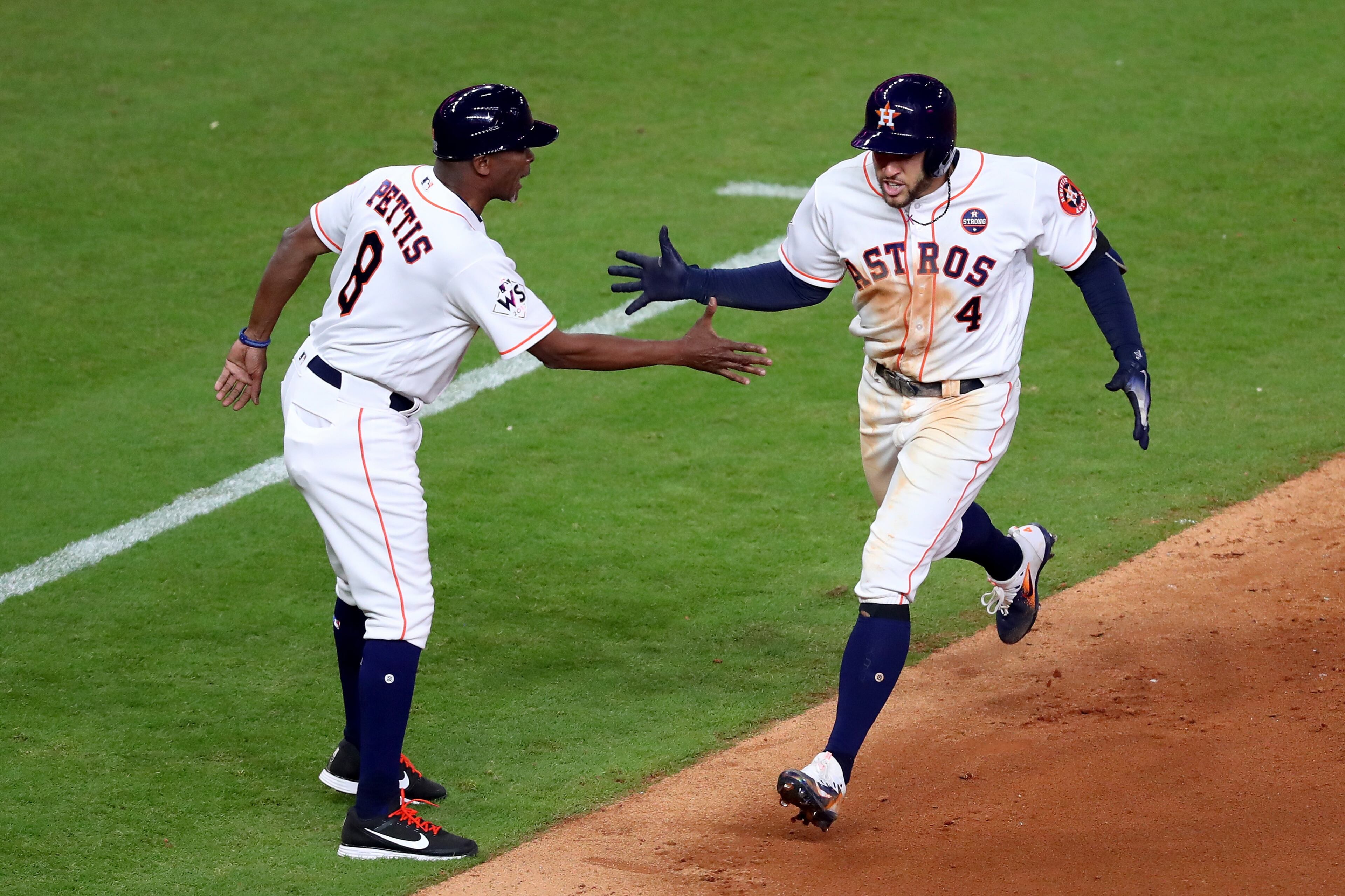 HOUSTON, TX - OCTOBER 29: George Springer #4 of the Houston Astros reacts as he hits a solo home run during the seventh inning against the Los Angeles Dodgers in game five of the 2017 World Series at Minute Maid Park on October 29, 2017 in Houston, Texas. (Photo by Tom Pennington/Getty Images)