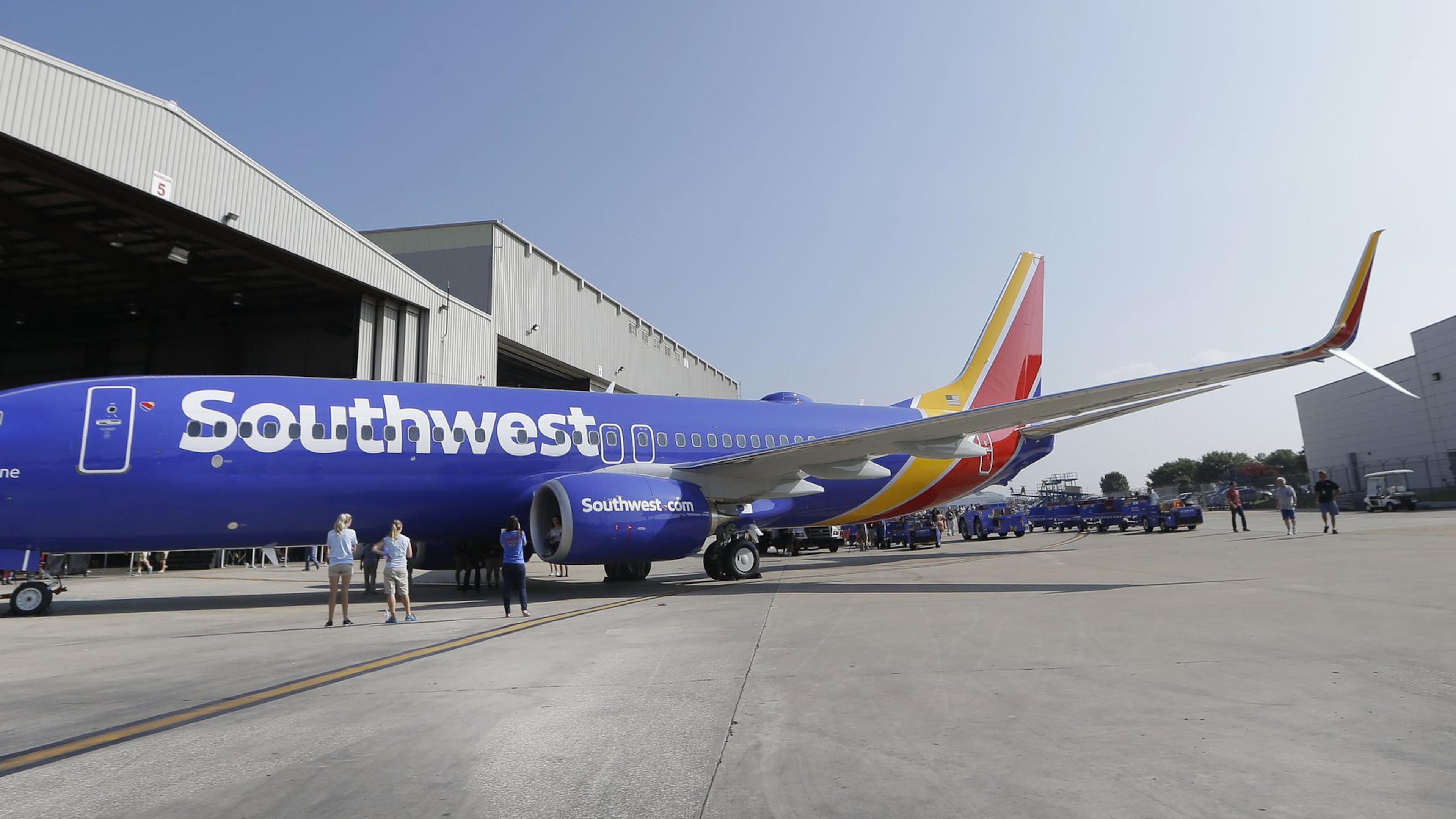 A Southwest Airlines jet at Love Field in Dallas, where the airline grew into a national powerhouse. Now it is locked in a battle with Delta Air Lines over Delta’s use of gate space there. (AP Photo/LM Otero, File)