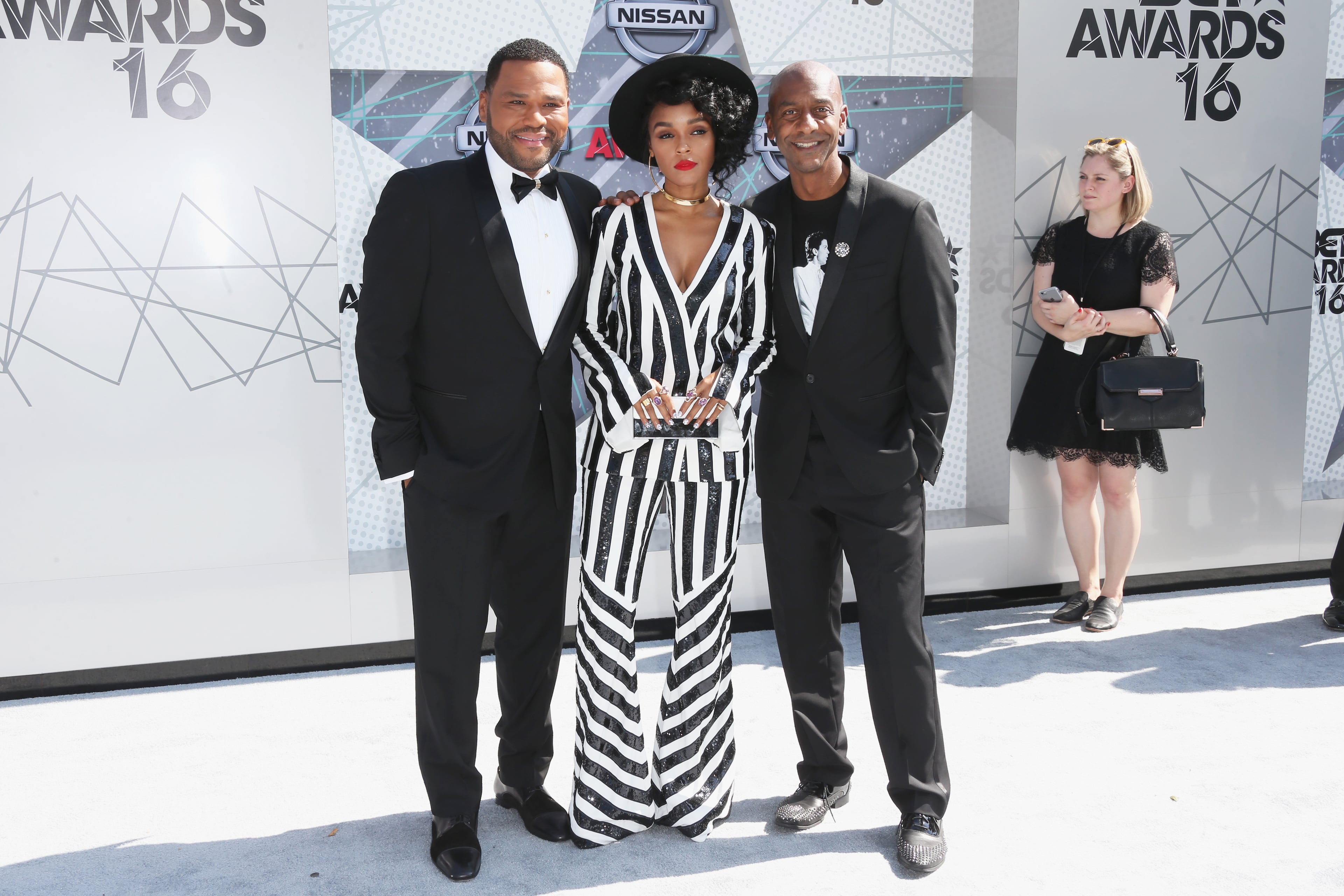 LOS ANGELES, CA - JUNE 26: (L-R) Actor Anthony Anderson, singer Janelle Monae, and BET President of Programming Stephen Hill attend the 2016 BET Awards at the Microsoft Theater on June 26, 2016 in Los Angeles, California. (Photo by Frederick M. Brown/Getty Images)
