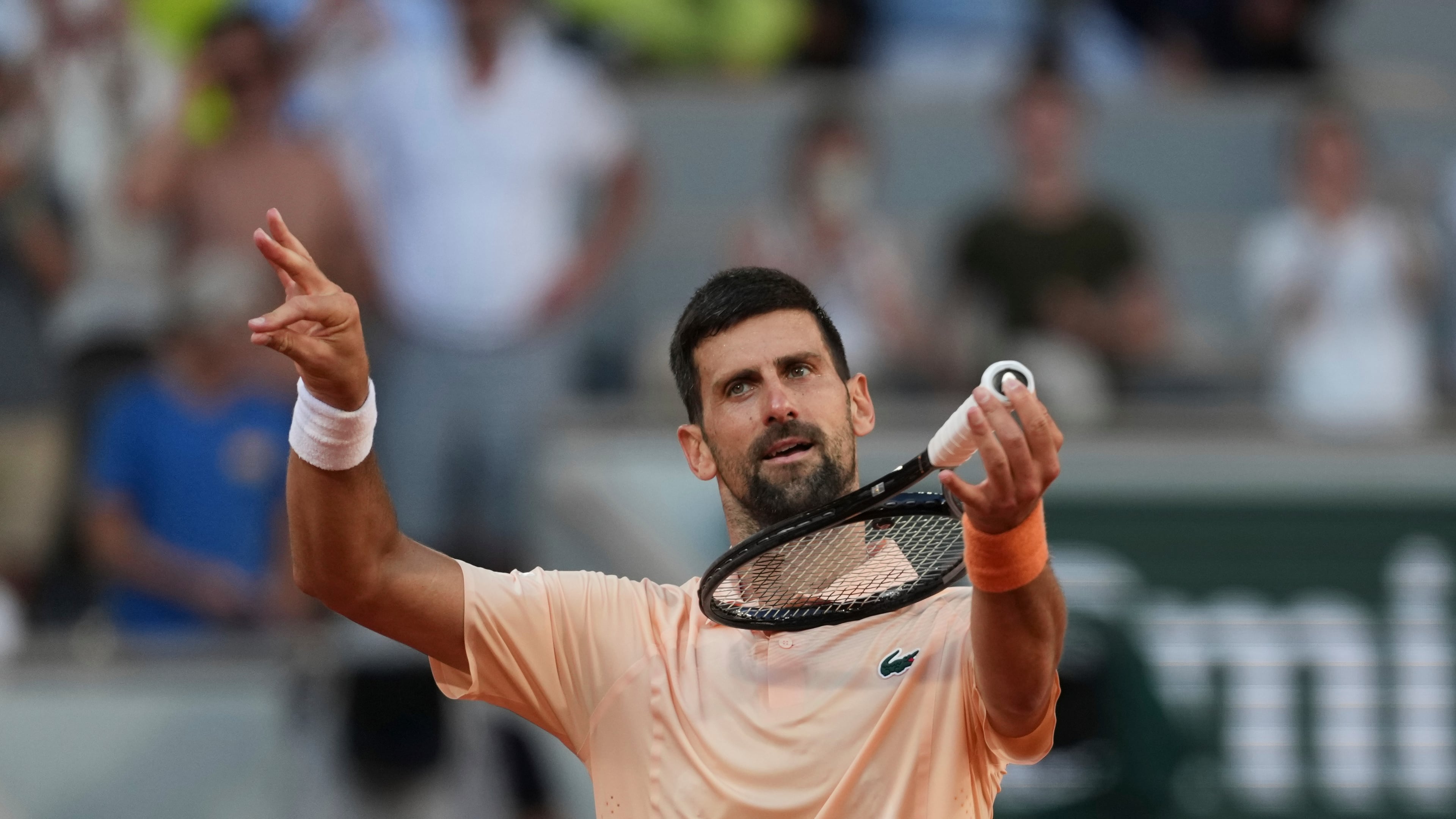 Novak Djokovic of Serbia celebrates after winning against Valentin Royer of France during their second round men's singles tennis match at the French Open tennis tournament in Paris, Wednesday, May 27, 2026. (AP Photo/Thibault Camus)