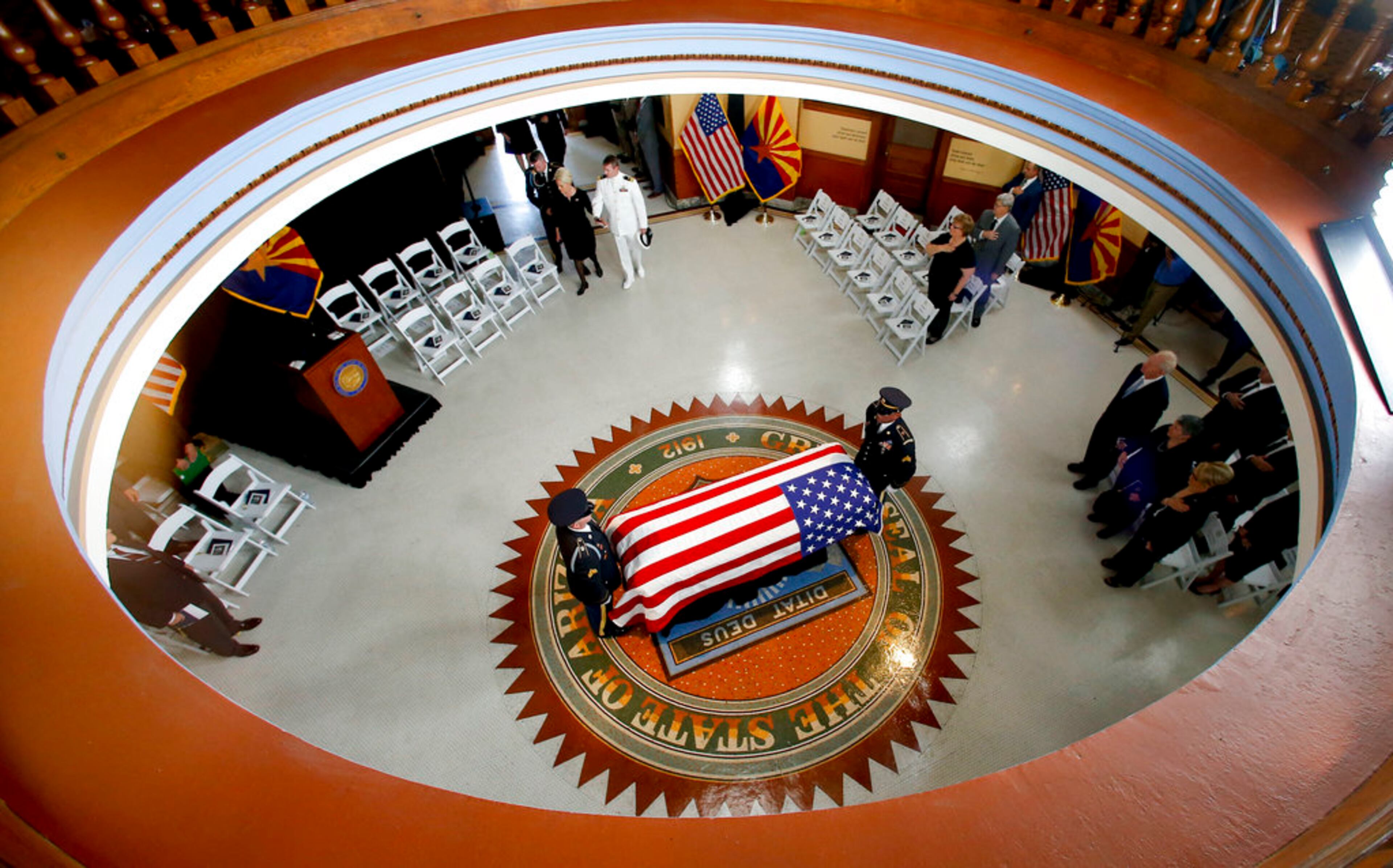 The Arizona National Guard carries the casket into the museum rotunda during a memorial service for Sen. John McCain, R-Ariz. at the Arizona Capitol on Wednesday, Aug. 29, 2018, in Phoenix. (AP Photo/Ross D. Franklin, Pool)