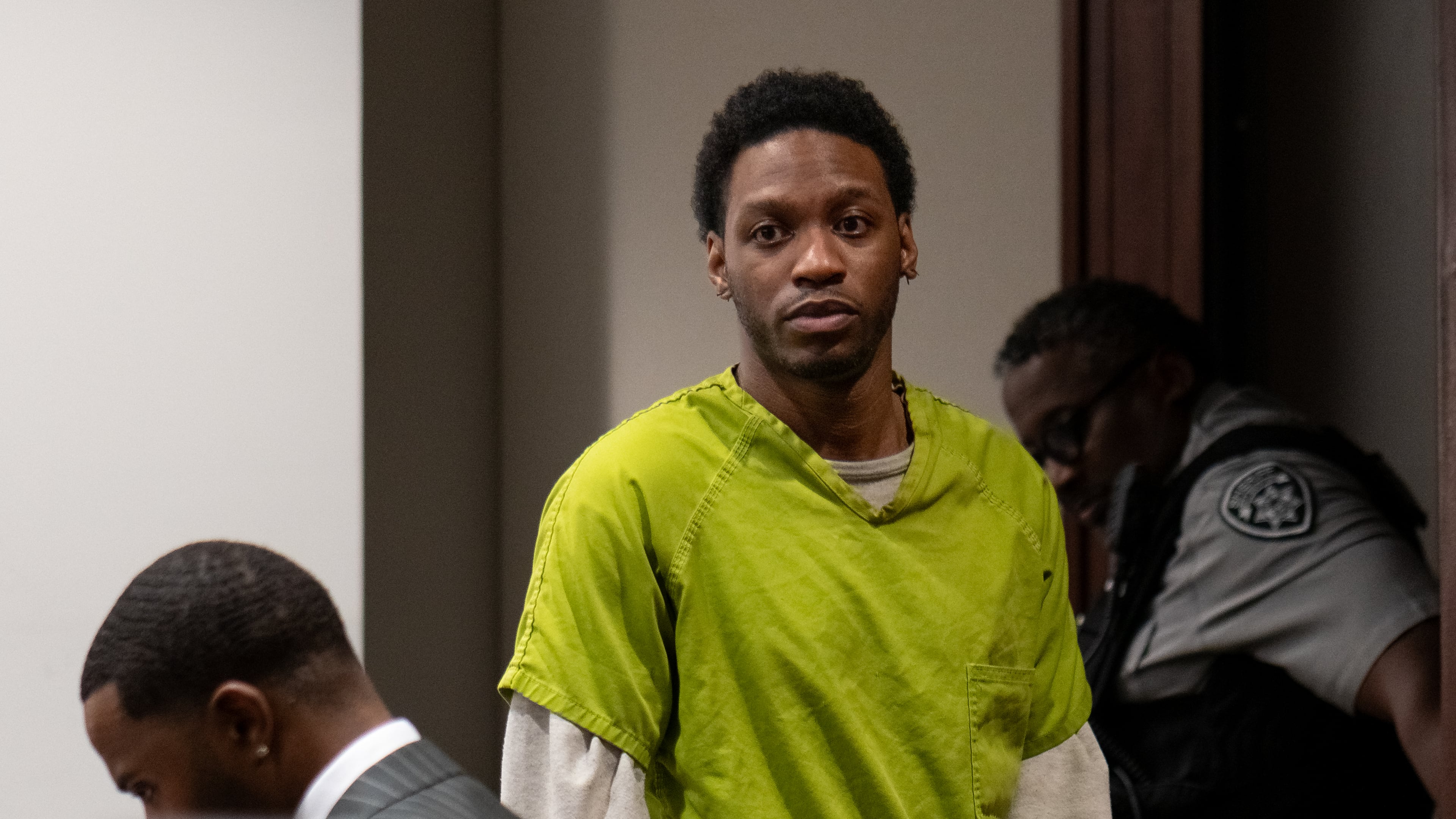 Kashman Thomas enters a Cobb County courtroom for a sentencing hearing on Thursday after pleading guilty to a reduced charge in a 2019 shooting that left a Kennesaw State University student dead and two others injured. (Ben Hendren for the AJC)