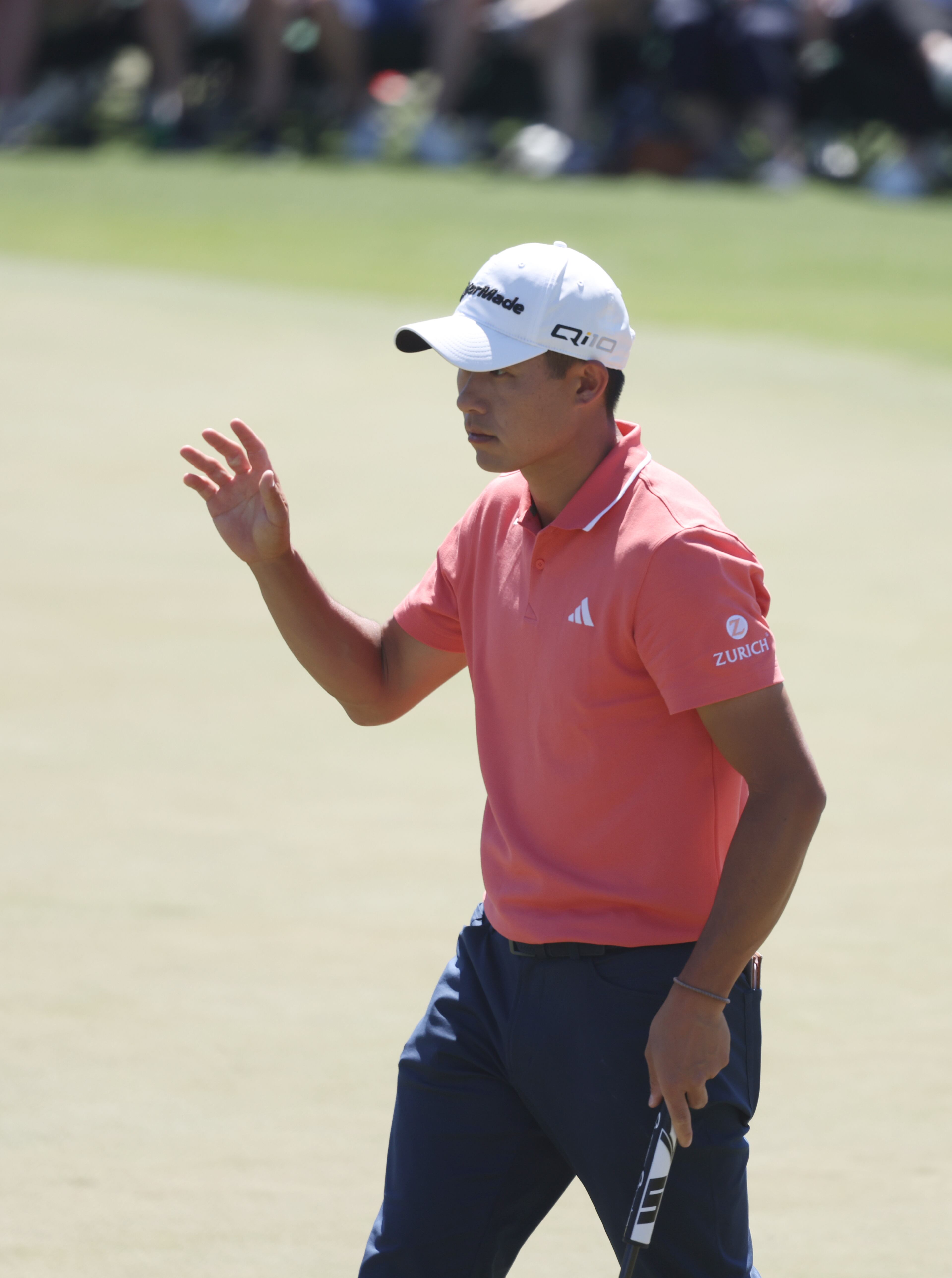 Collin Morikawa reacts to making birdie putt on second hole during third round at the 2024 Masters Tournament at Augusta National Golf Club, Saturday, April 13, 2024, in Augusta, Ga. Jason Getz / Jason.Getz@ajc.com)
