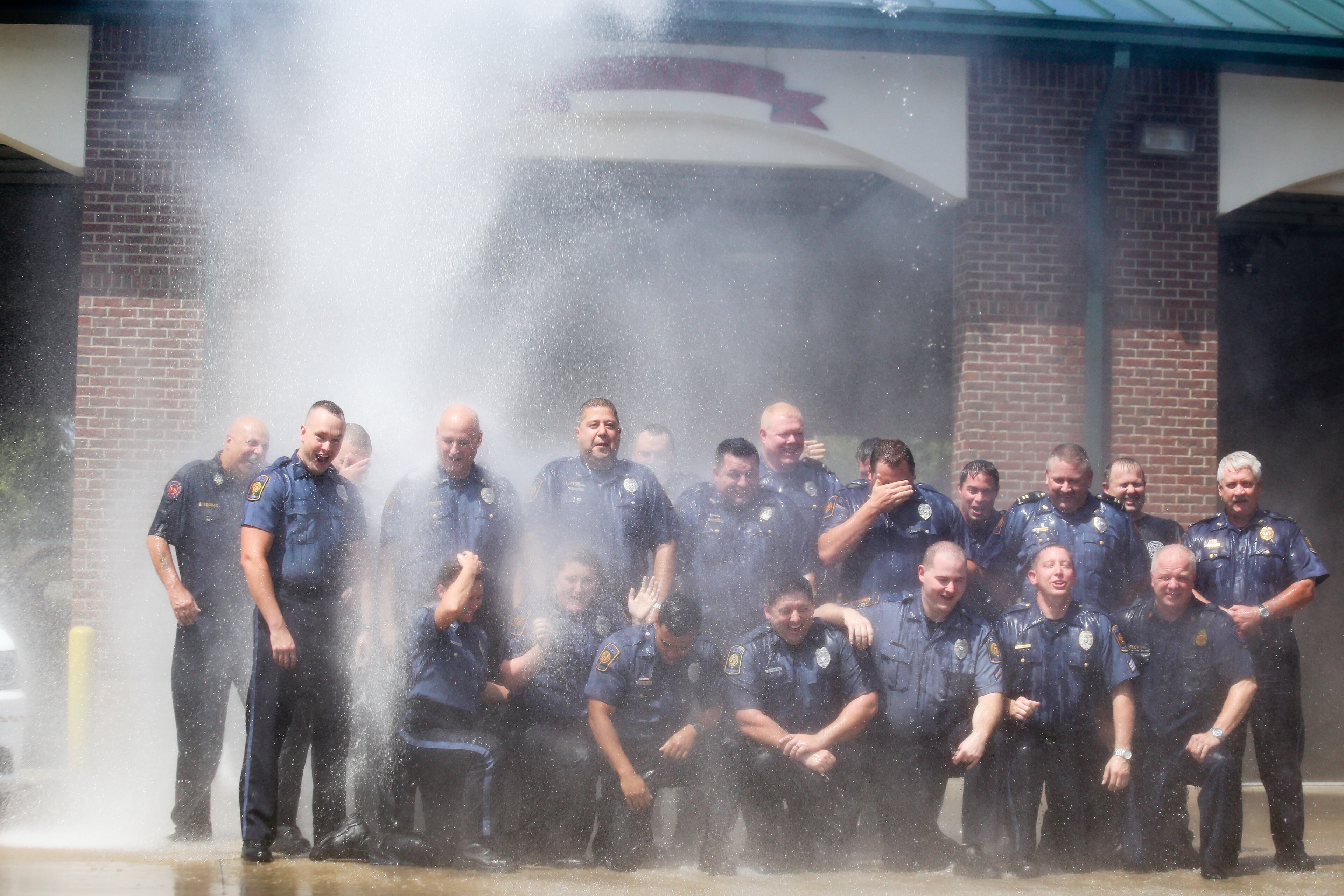 The men and women of the Woodstock police department were nominated to take the ALS Ice Bucket Challenge, which they completed on Friday, August 22, 2014. Each officer that participated donated to the ALS Association – Georgia Chapter raising $330.00.